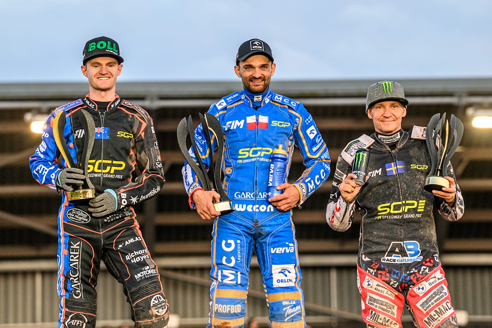 Top3: (L to R) Brady Kurtz (2nd), Bartosz Zmarzlik (First), Fredrik Lindgren (3rd) during the ATPI FIM Speedway Grand Prix Round 5 at the National Speedway Stadium, Manchester, on Saturday 14th June 2025. (Photo: Ian Charles | MI News)