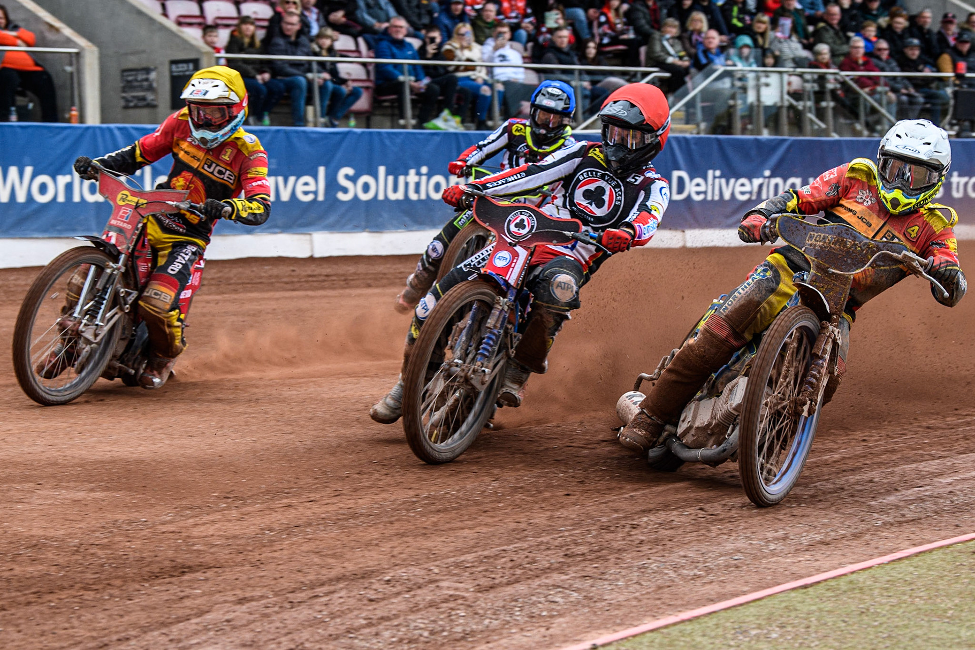 Brady Kurtz  (Red) between Chris Harris  (White) and Max Fricke  (Yellow) with Tom Brennan  (Blue) behind  during the SGB Premiership match between Belle Vue Aces and Leicester Lions at the National Speedway Stadium, Manchester on Monday 1st May 2023. (Photo: Ian Charles | MI News)