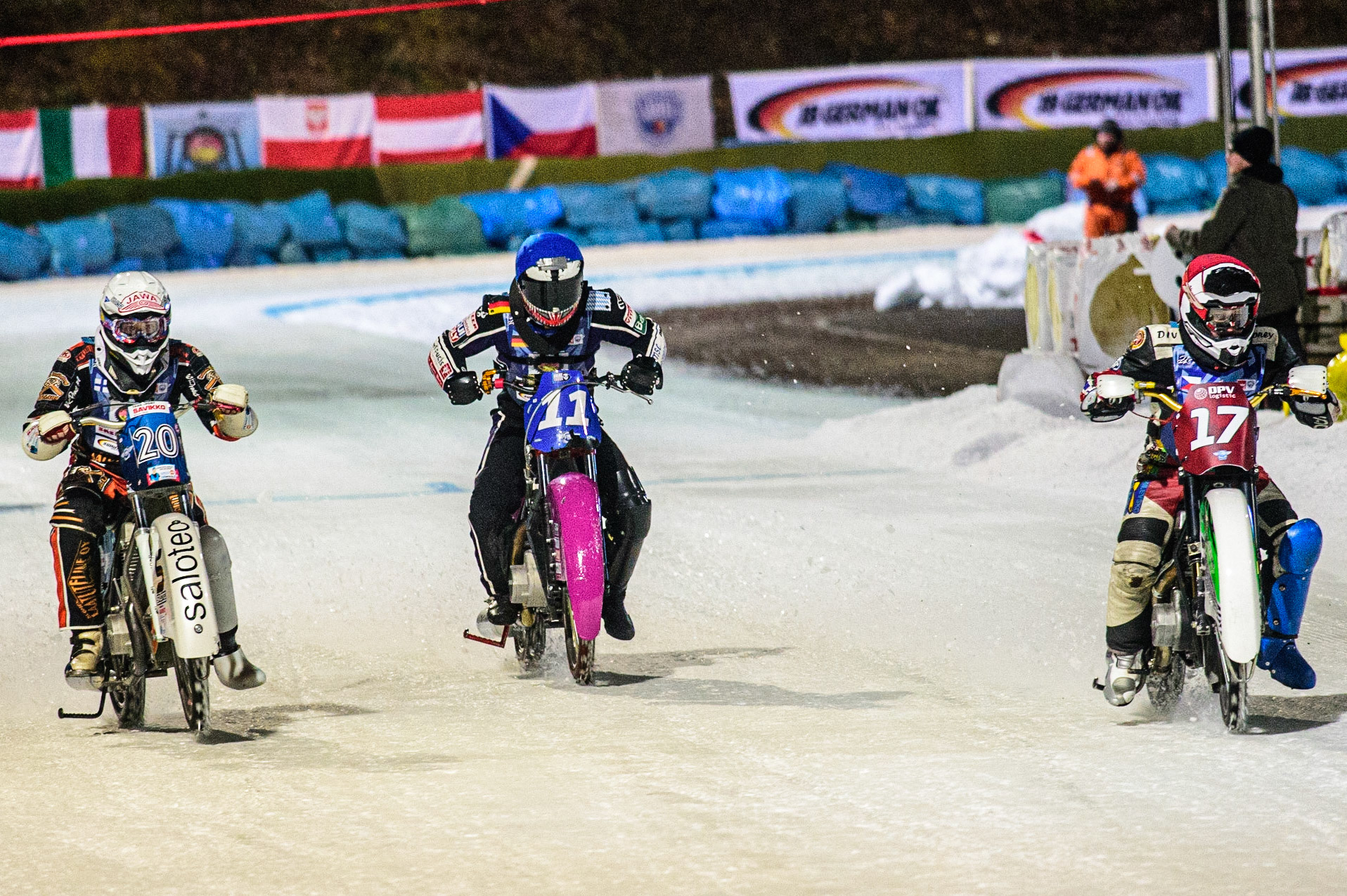 Andrej Divis (Red) inside Finn Loheider (Blue) and Artturi Ervasti (White) during the German Individual Ice Speedway Championship at Horst-Dohm-Eisstadion, Berlin on Friday 3rd March 2023. (Photo: Ian Charles | MI News)