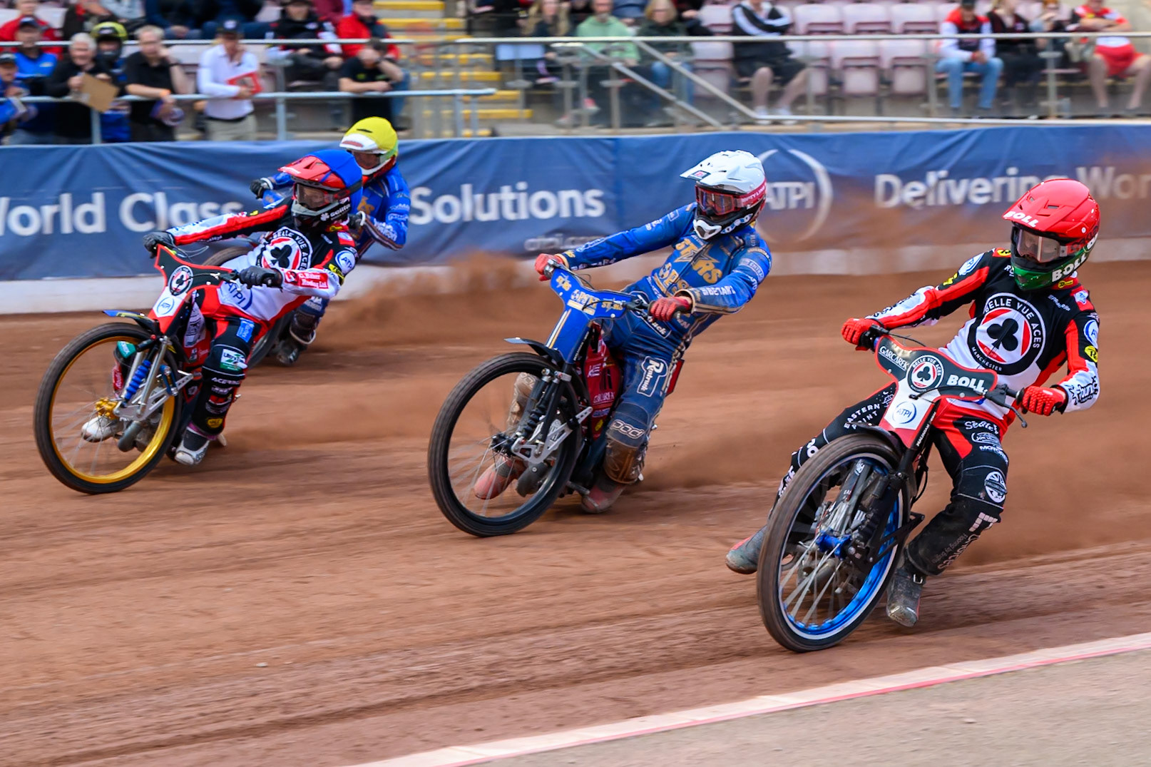 Brady Kurtz of Belle Vue Aces in Red rides inside Max Fricke of Kings Lynn Stars in White Jason Doyle of Belle Vue Aces in Blue and Jan Kvech of Kings Lynn Stars in Yellow during the Rowe Motor Oil Premiership match between Belle Vue Aces and King's Lynn Stars at the National Speedway Stadium, Manchester on Monday 29th June 2026. (Photo: Ian Charles | MI News)