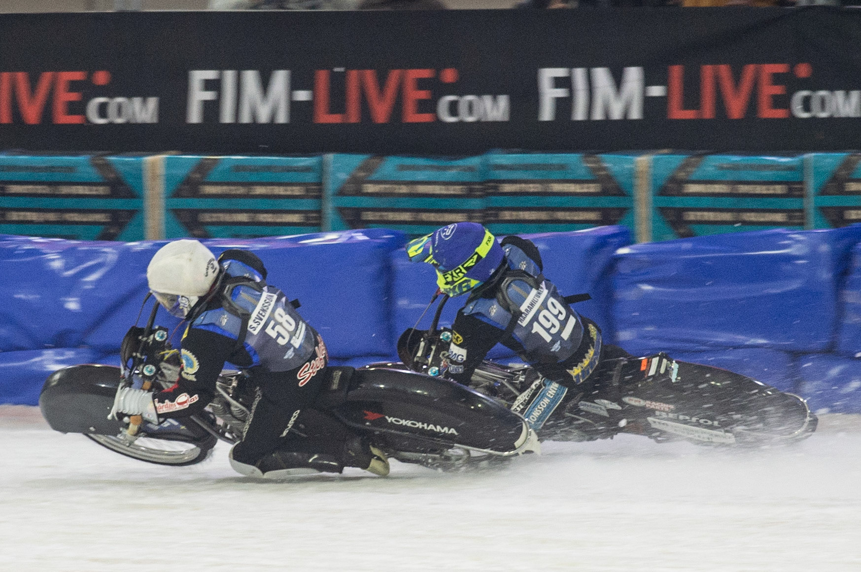 Photo: Ian Charles

Stefan Svensson (58) holds out Martin Haarahiltunen (199)

FIM Ice Speedway Gladiators World Championship, Event 5.1, Ice Rink Thialf, Heerenveen, Netherlands Saturday  30  March  2019