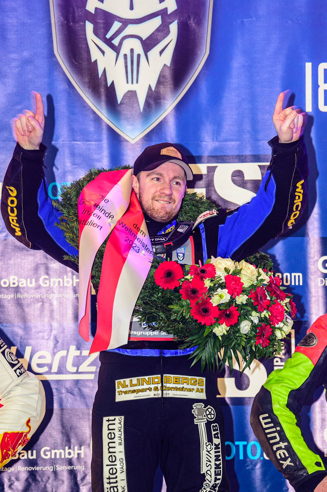 Martin Haarahiltunen on the winners spot on the Rostrum during the Ice Speedway Gladiators World Championship Final 2 at Max-Aicher-Arena, Inzell, Germany on Sunday 19th March 2023. (Photo: Ian Charles | MI News)