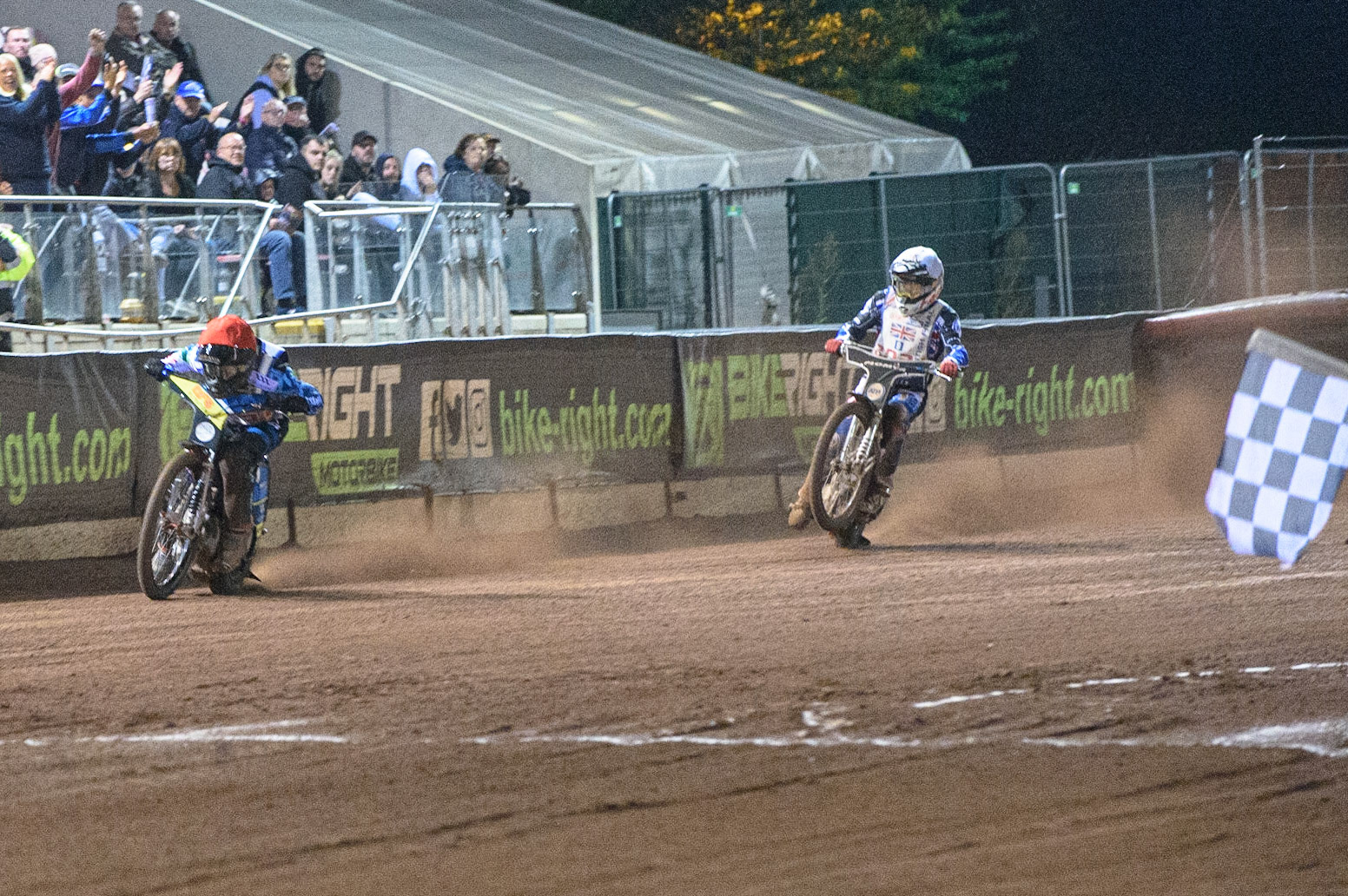MANCHESTER, UK. AUGUST 16TH   Adam Ellis  crosses the finish line as Champion during the Sports Insure British Speedway Finals at the National Speedway Stadium, Manchester on Monday 16th August 2021. (Credit: Ian Charles | MI News)