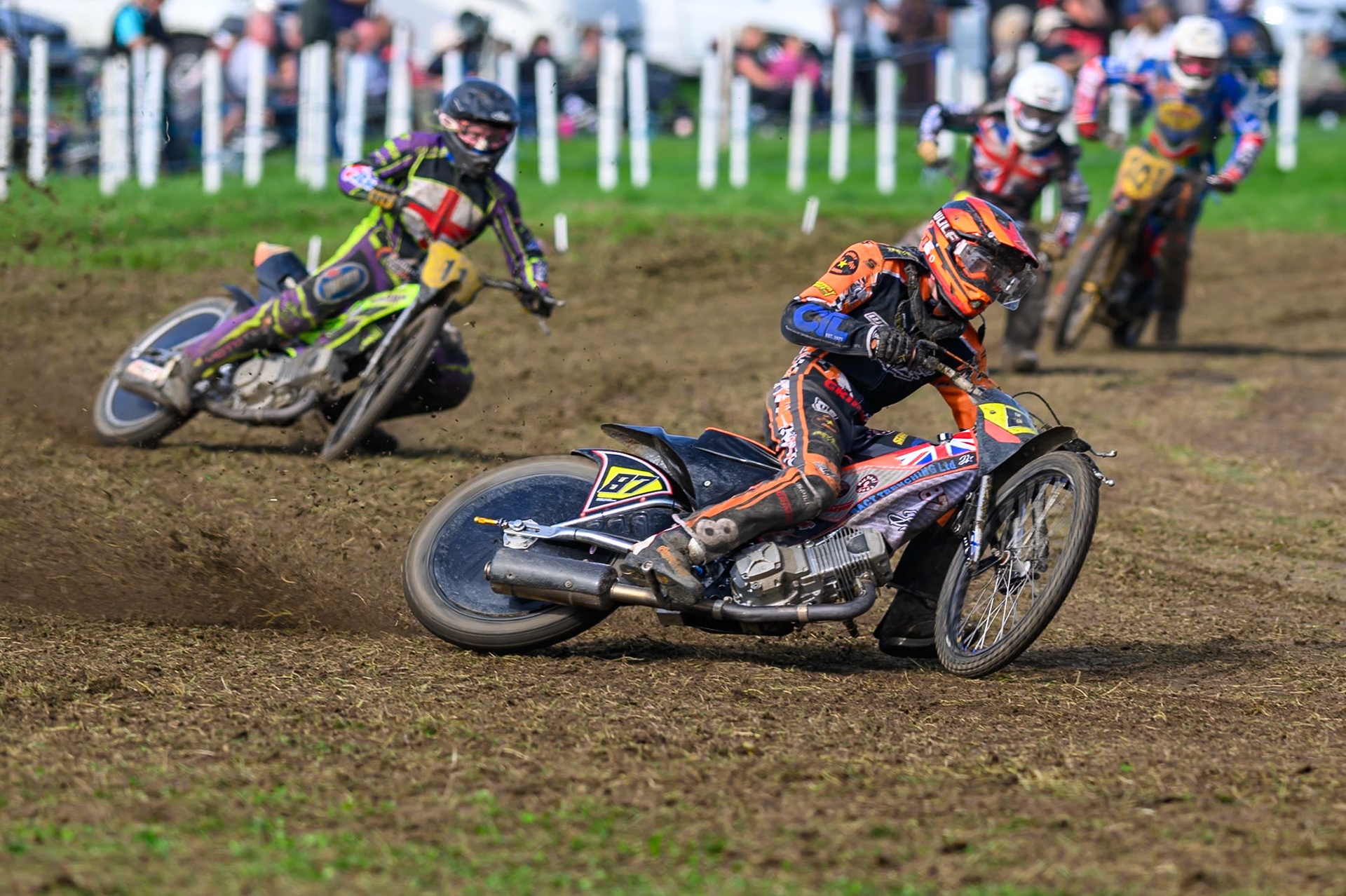 British Masters (Solos): Mickie Simpson (87) leading Paul Cooper (11)  Alfie Bowtell (202) and Cameron Taylor (101) during the British Masters Grasstrack Championship at Lower Marsh Farm, Much Hoole, Preston in Lancashire, England on Sunday 13th September 2026. (Photo: Ian Charles | MI News)