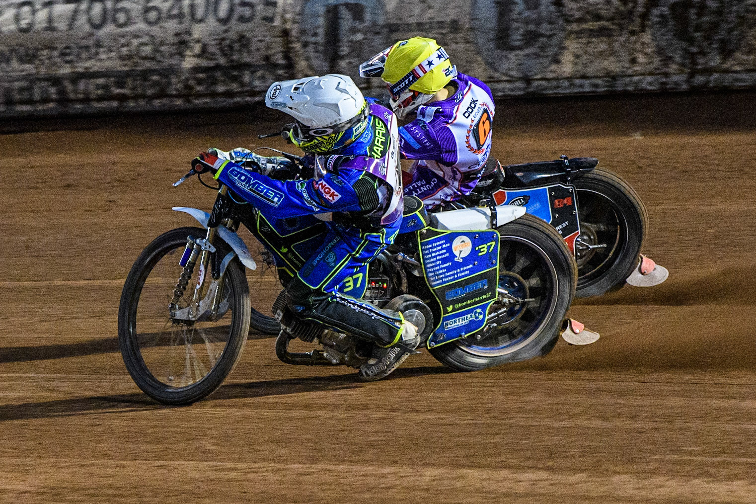 Chris Harris   (White) inside team mate Ben Cook  (Yellow) during the SGB Premiership match between Belle Vue Aces and Peterborough at the National Speedway Stadium, Manchester on Monday 24th April 2023. (Photo: Ian Charles | MI News)