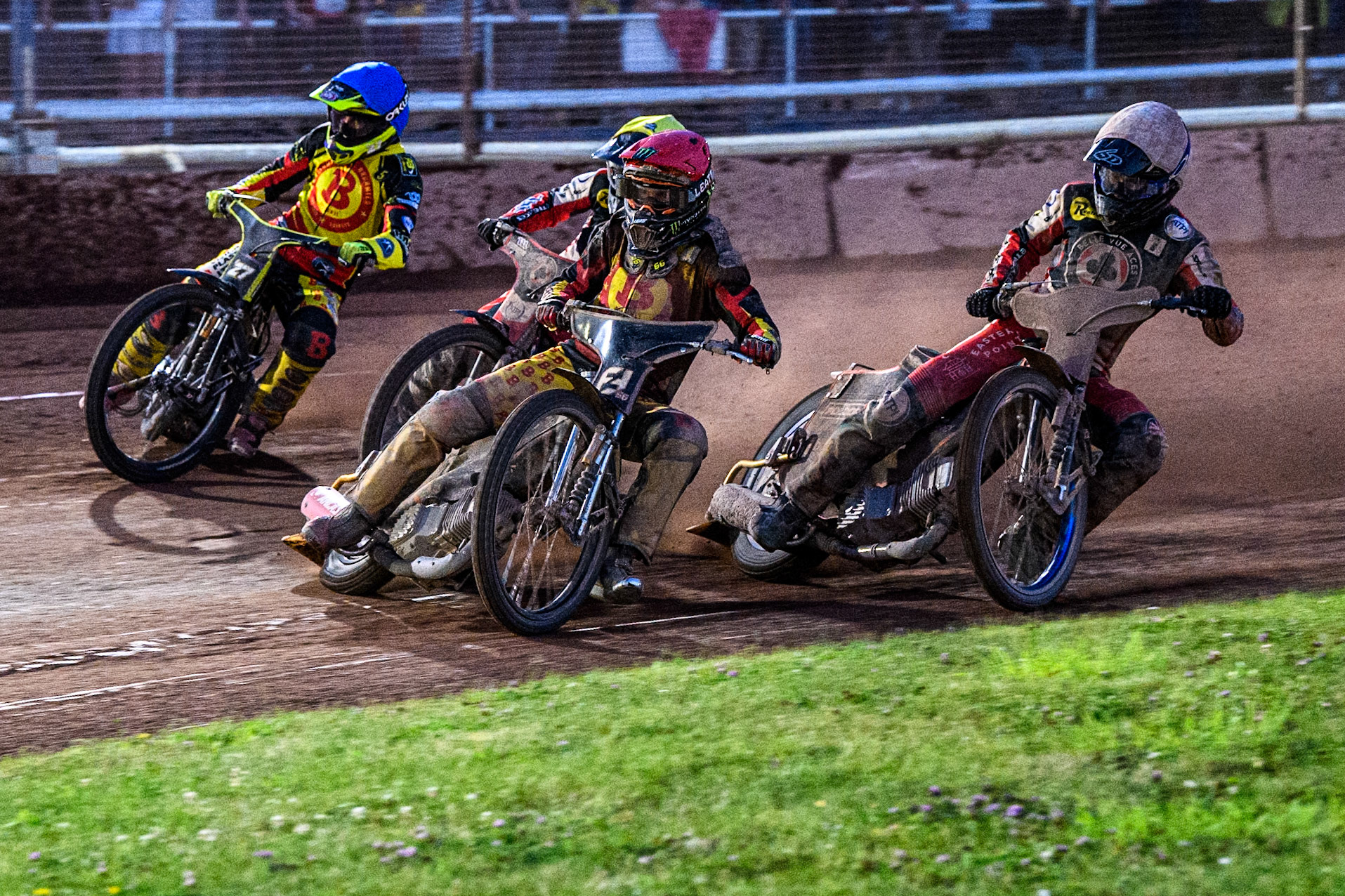 Birmingham Brummies' Freddie Lindgren in Red leading Birmingham Brummies' Tom Brennan in Blue, Belle Vue Aces' Brady Kurtz in White and Belle Vue Aces' Ben Cook in Yellow during the Rowe Motor Oil Premiership match between Birmingham Brummies and Belle Vue Aces at Perry Bar Stadium, Birmingham on Monday 29th July 2024. (Photo: Ian Charles | MI News)