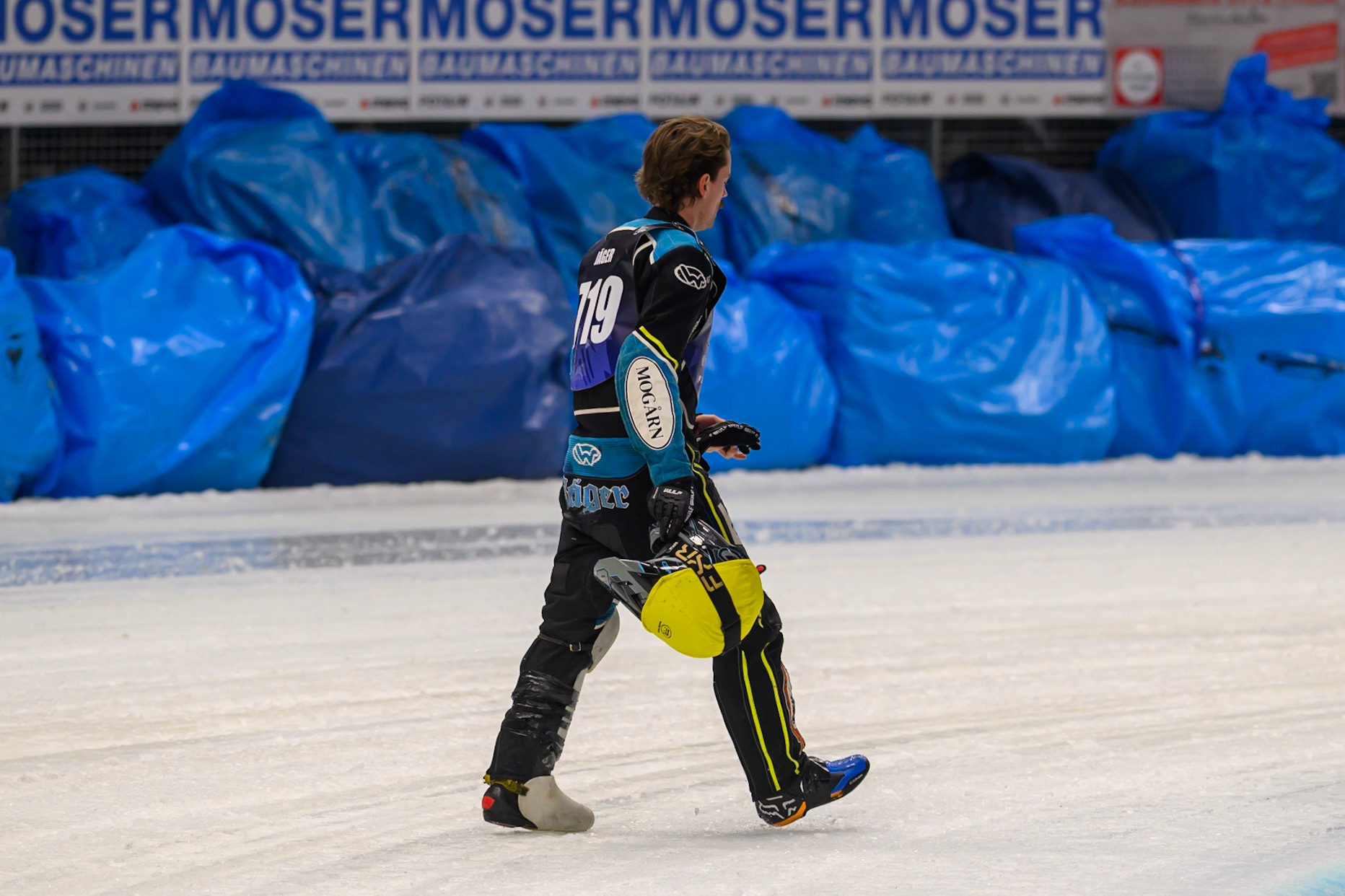 Filip Jäger (719) of Sweden walks off after his fall during the Ice Speedway Gladiators World Championship Final 2 at Max-Aicher-Arena, Inzell on Sunday 15th March 2026. (Photo: Ian Charles | MI News)
