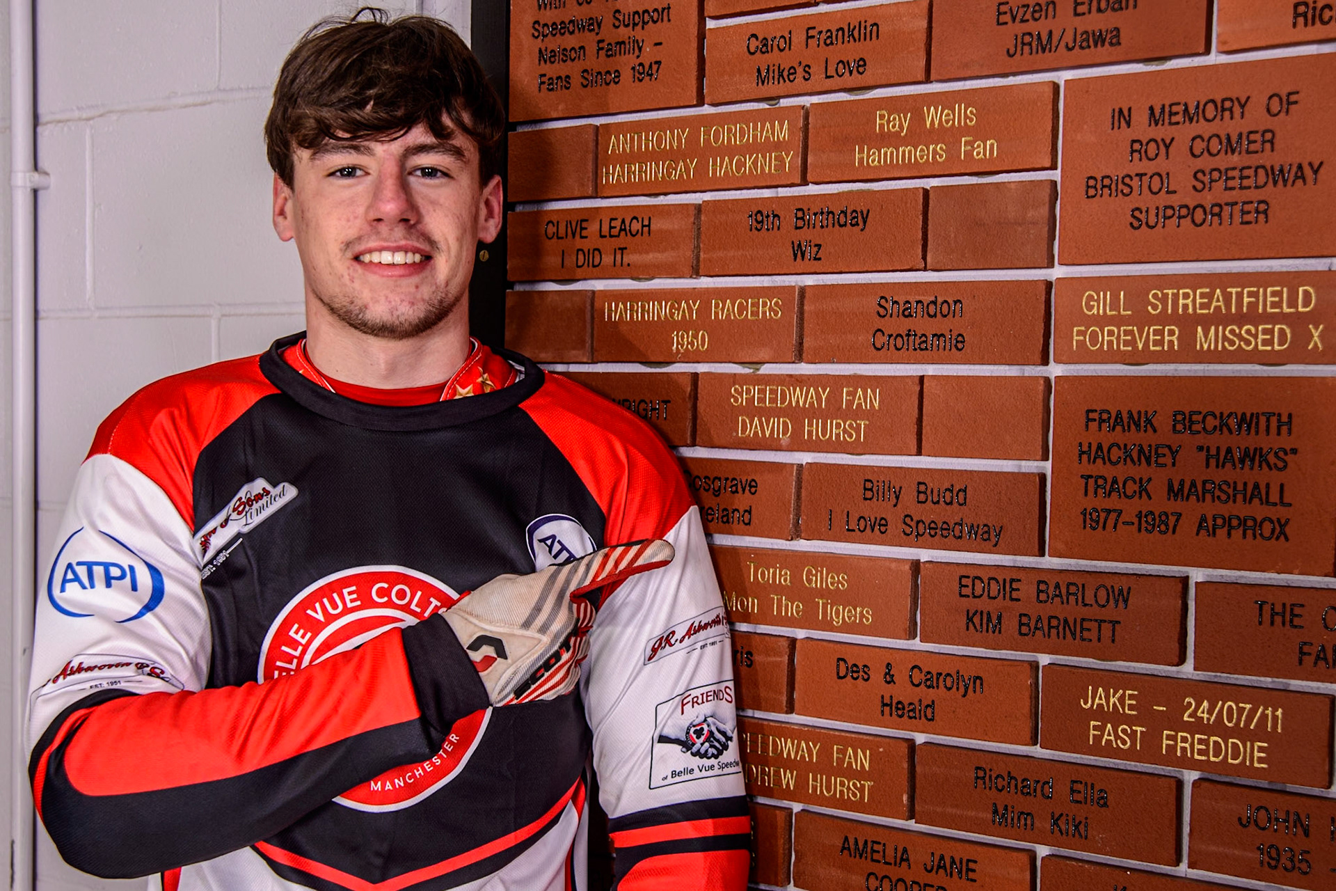 Billy Budd proudly points to the brick he bought on the Belle Vue Concourse during the Belle Vue Aces Media Day at the National Speedway Stadium, Manchester on Wednesday 12th March 2025. (Photo: Ian Charles | MI News)