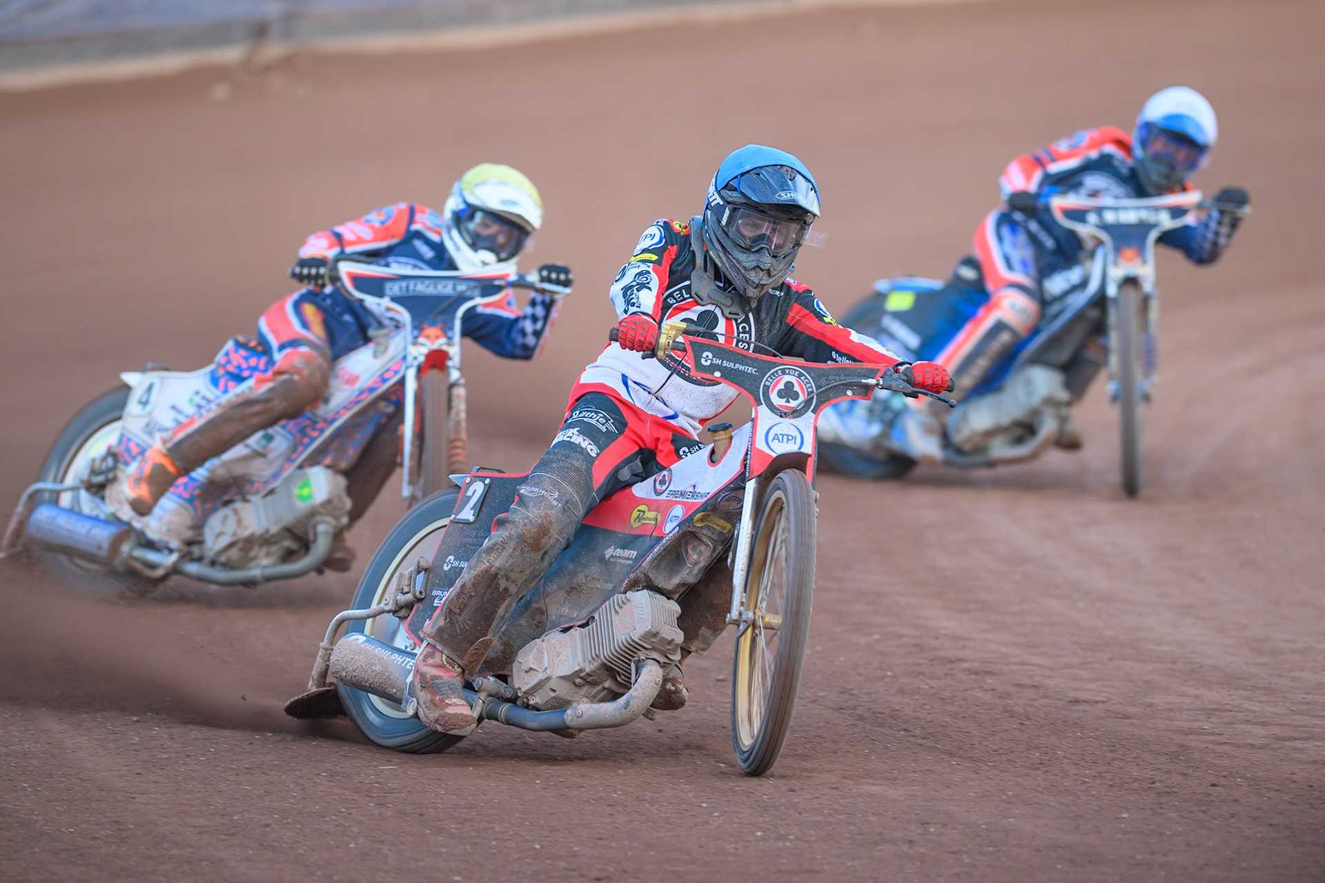 Norick Blodorn of Belle Vue Aces in Blue leading Niels-Kristian Iversen of Northampton Foxes in Yellow and Matej Zagar of Northampton Foxes in White during the Rowe Motor Oil Premiership match between Belle Vue Aces and Northampton Foxes at the National Speedway Stadium, Manchester on Monday 13th July 2026. (Photo: Ian Charles | MI News)