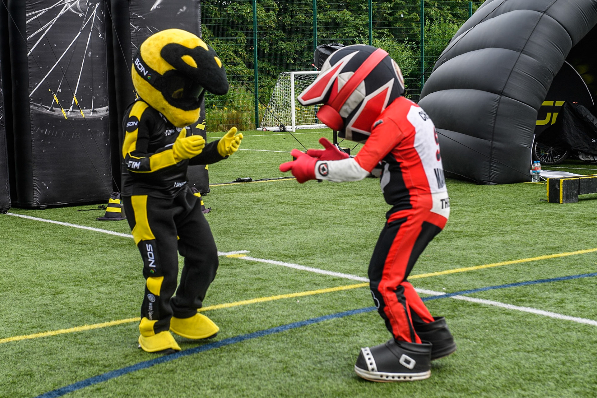 Speedy and Chase the Ace have a dance in the Fan Zone during the Monster Energy FIM Speedway of Nations Semi-Final 1 at the National Speedway Stadium, Manchester on Tuesday 9th July 2024. (Photo: Ian Charles | MI News)