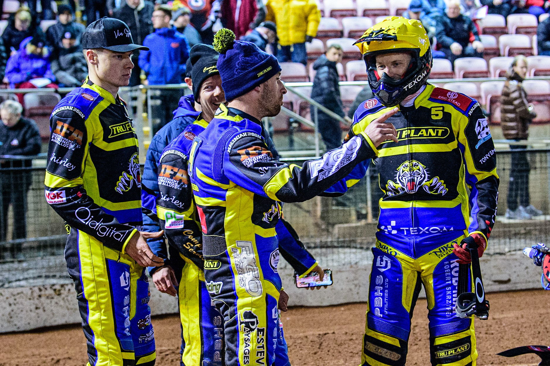 Sheffield ‘TruPlant’ Tigers  congratulate Tobiasz Musielak  (right) on his match winning ride during the SGB Premiership match between Belle Vue Aces and Sheffield Tigers at the National Speedway Stadium, Manchester on Monday 27th March 2023. (Photo: Ian Charles | MI News)