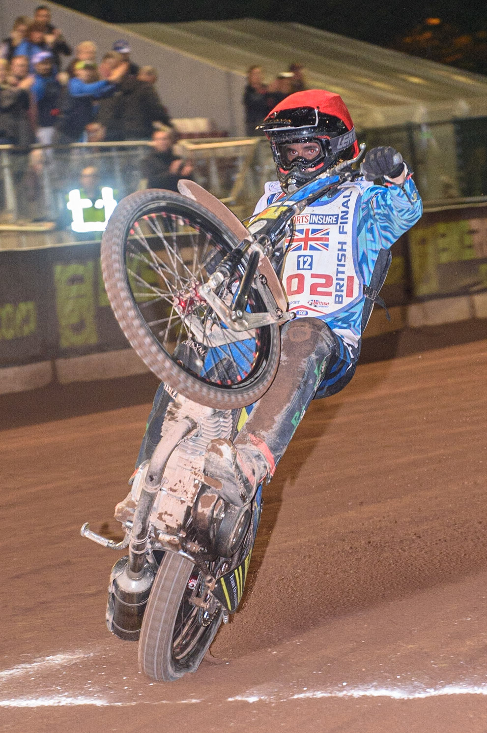 MANCHESTER, UK. AUGUST 16TH   A celebration wheelies from British Champion Adam Ellis  during the Sports Insure British Speedway Finals at the National Speedway Stadium, Manchester on Monday 16th August 2021. (Credit: Ian Charles | MI News)