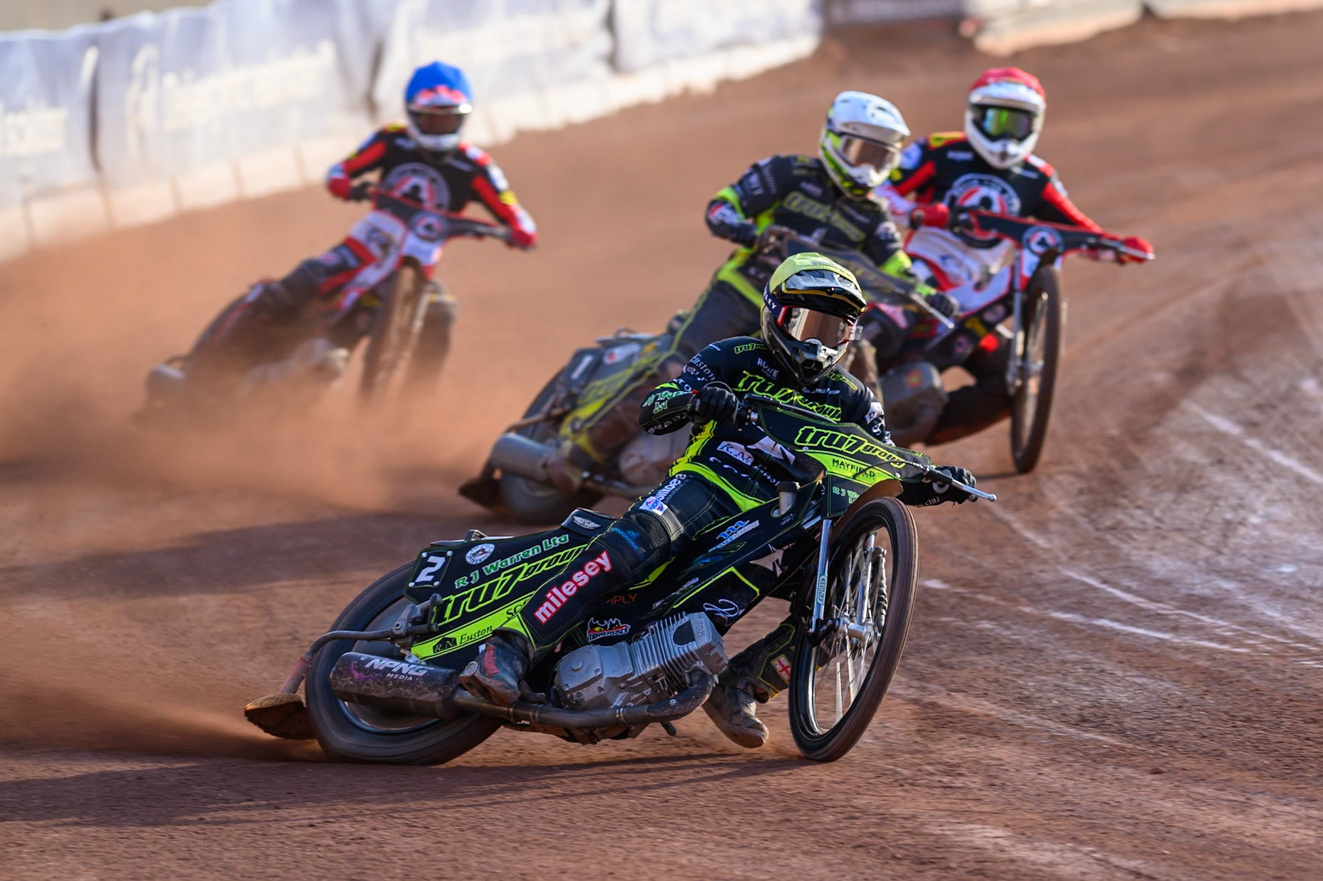 Danny King of Ipswich Witches in Yellow leading Tom Brennan of Ipswich Witches in White, Peter Kildemand of Belle Vue Aces in Red and Zach Cook of Belle Vue Aces in Blue during the Rowe Motor Oil Premiership match between Belle Vue Aces and Ipswich Witches at the National Speedway Stadium, Manchester on Saturday 20th June 2026. (Photo: Ian Charles | MI News)