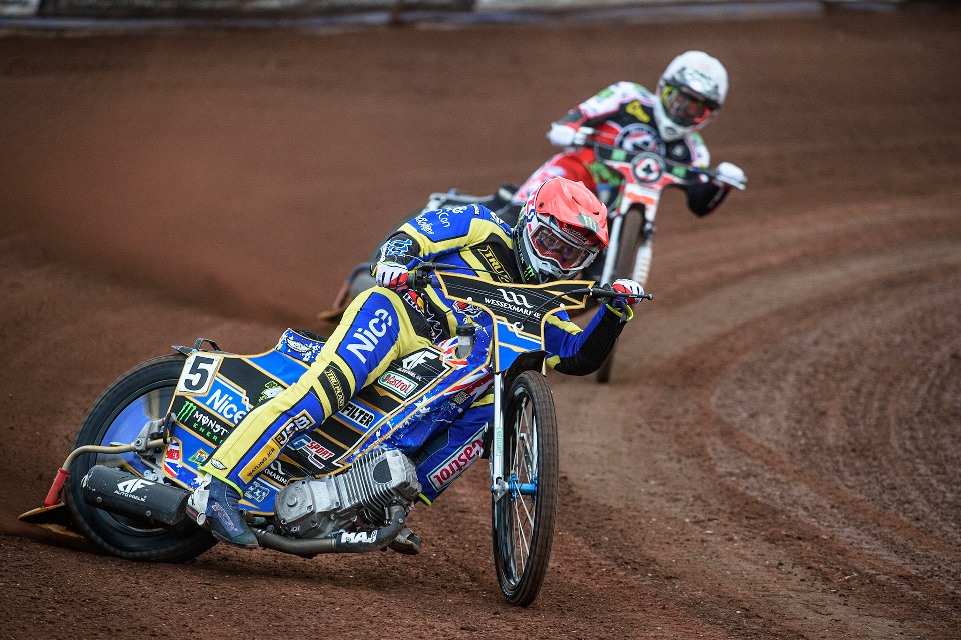 SHEFFIELD, UK. JULY 1ST     Jack Holder  (Red) leads Dan Bewley  (White) during the SGB Premiership match between Sheffield Tigers and Belle Vue Aces at Owlerton Stadium, Sheffield on Thursday 1st July 2021. (Credit: Ian Charles | MI News)