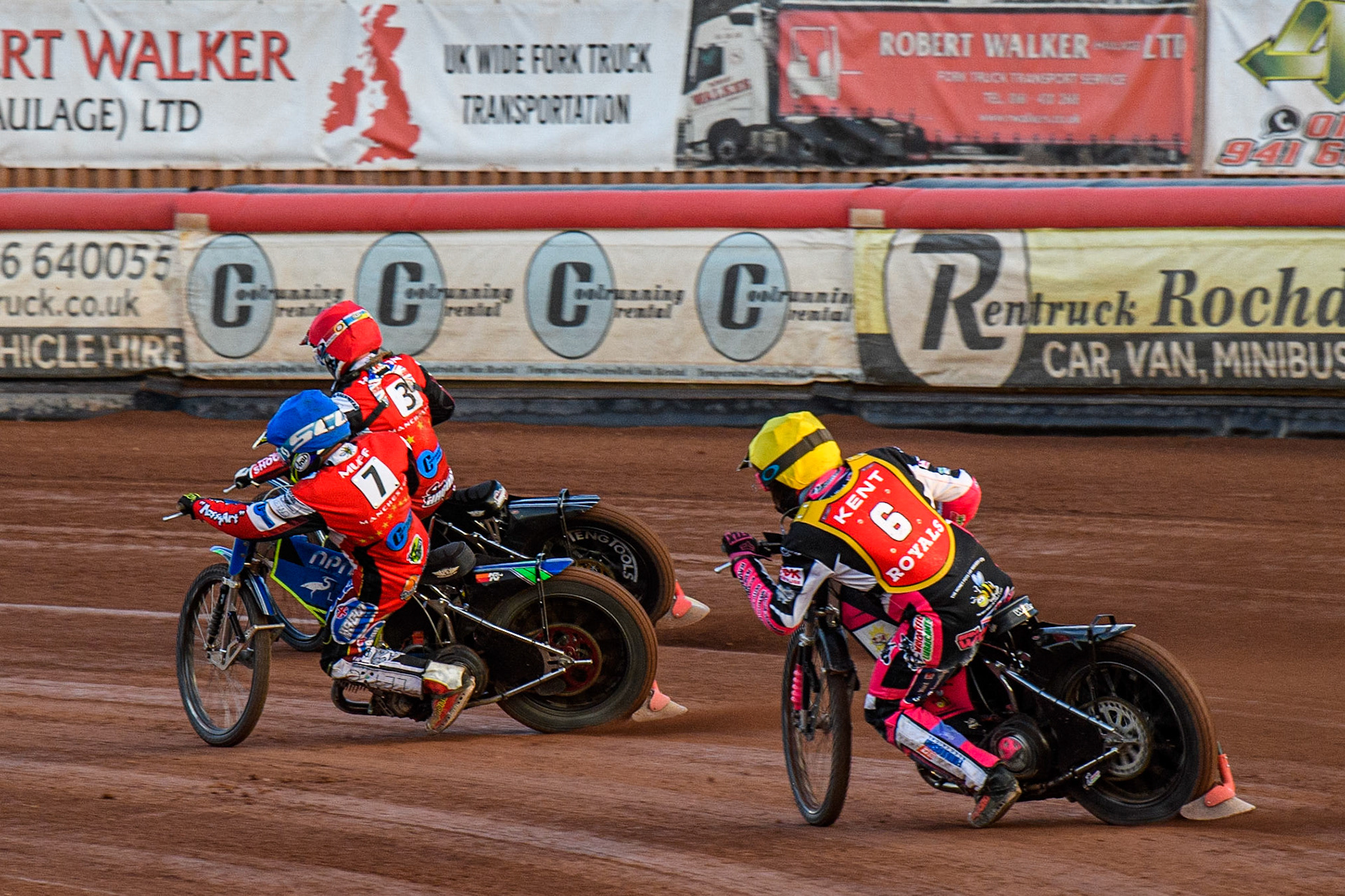 Sam Woolley (Yellow) chases Luke Muff (Blue) and Sam Hagon (Red) during the National Development League match between Belle Vue Colts and Kent Royals at the National Speedway Stadium, Manchester on Friday 7th July 2023. (Photo: Ian Charles | MI News)