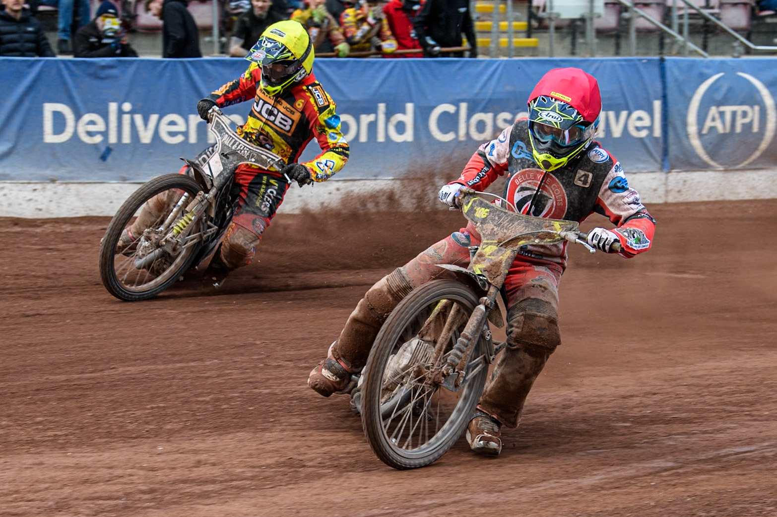 Belle Vue Colts' Luke Muff (Red) inside Leicester Lion Cubs' Luke Crang (Yellow) during the WSRA National Development League match between Belle Vue Colts and Leicester Lion Cubs at the National Speedway Stadium, Manchester on Friday 29th March 2024. (Photo: Ian Charles | MI News)