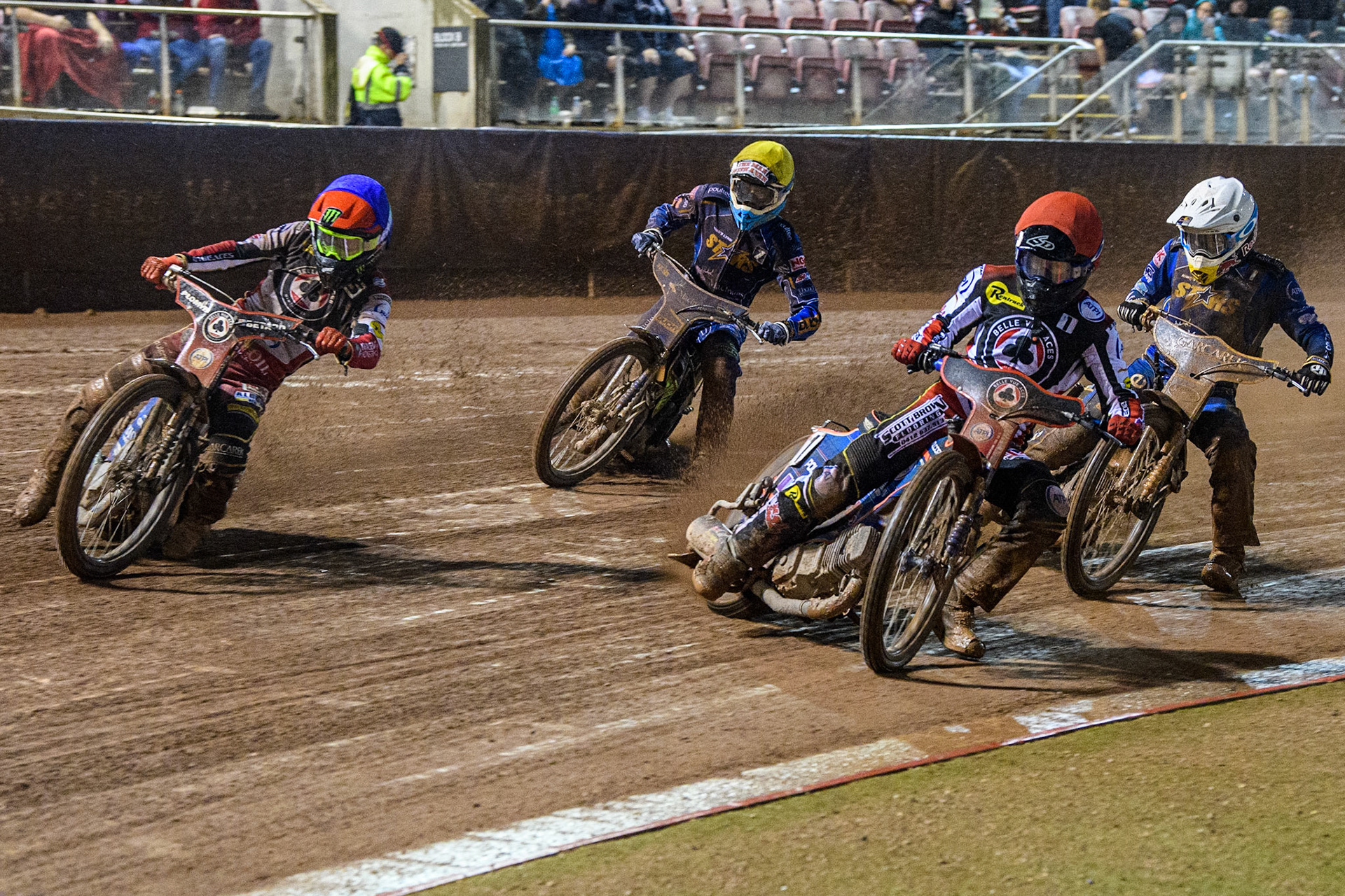 Brady Kurtz (Red) and Dan Bewley (Blue) leads Robert Lambert (White) and Anders Rowe (Yellow) during the Sports Insure Premiership match between Belle Vue Aces and King's Lynn Stars at the National Speedway Stadium, Manchester on Monday 21st August 2023. (Photo: Ian Charles | MI News)