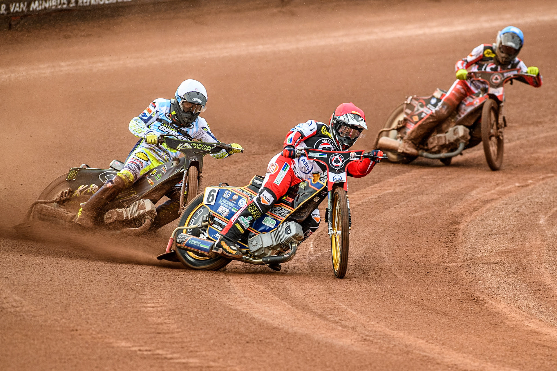 Belle Vue Aces' Connor Mountain in Red leading Oxford Spires' Craig Cook in White and Belle Vue Aces' Connor Bailey in Blue during the Rowe Motor Oil Premiership match between Belle Vue Aces and Oxford Spires at the National Speedway Stadium, Manchester on Monday 13th May 2024. (Photo: Ian Charles | MI News)