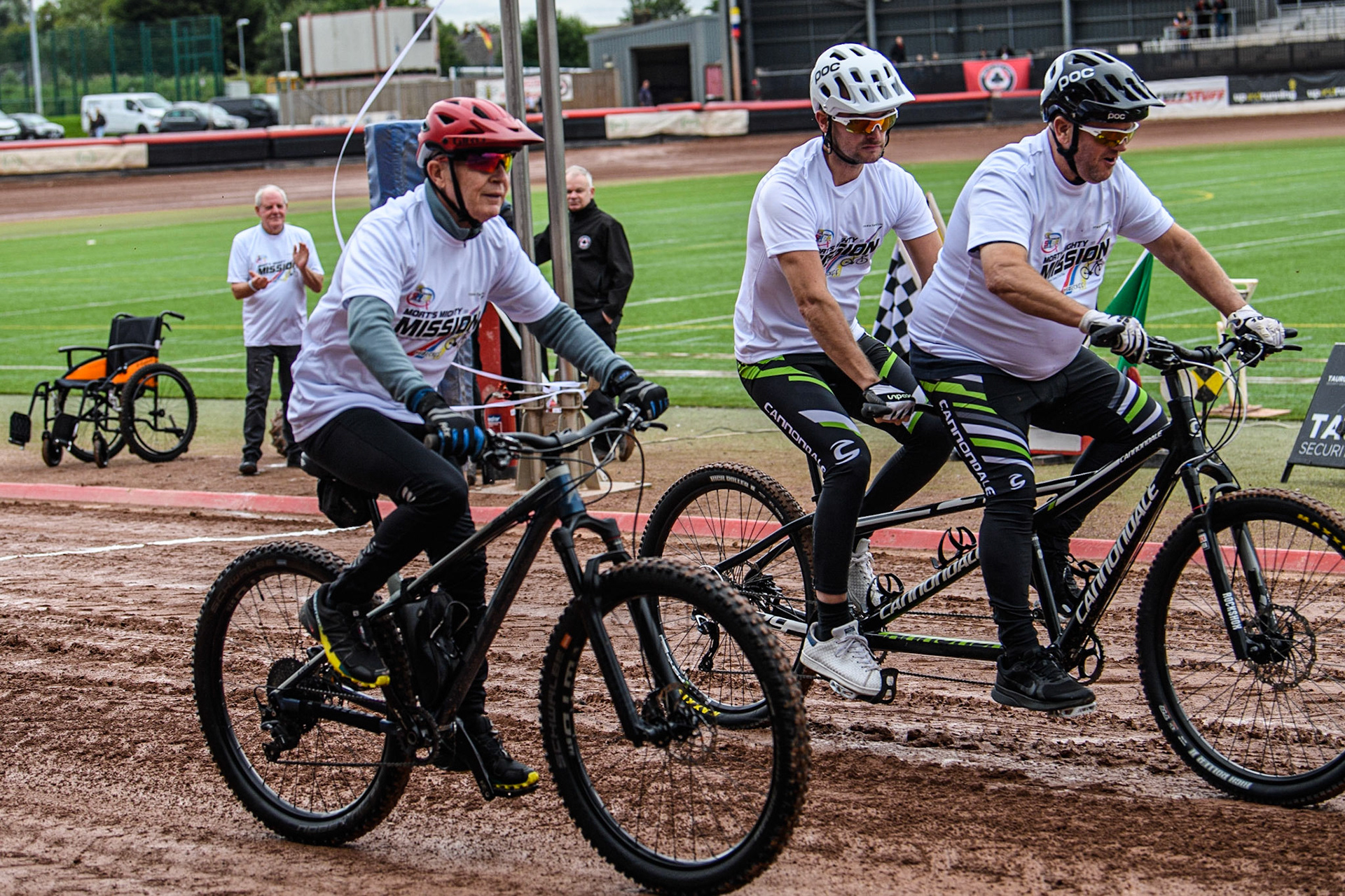 Former Belle Vue Rider Chris Morton (nearest Camera) together with former rider Ricky Ashworth and his tandem pilot, Dad Dave, start ‘Mort’s Mighty Mission’, to ride to the Principality Stadium Cardiff, in aid of the Speedway Riders Benevolent Fund during the Sports Insure Premiership match between Belle Vue Aces and Leicester Lions at the National Speedway Stadium, Manchester on Monday 28th August 2023. (Photo: Ian Charles | MI News)