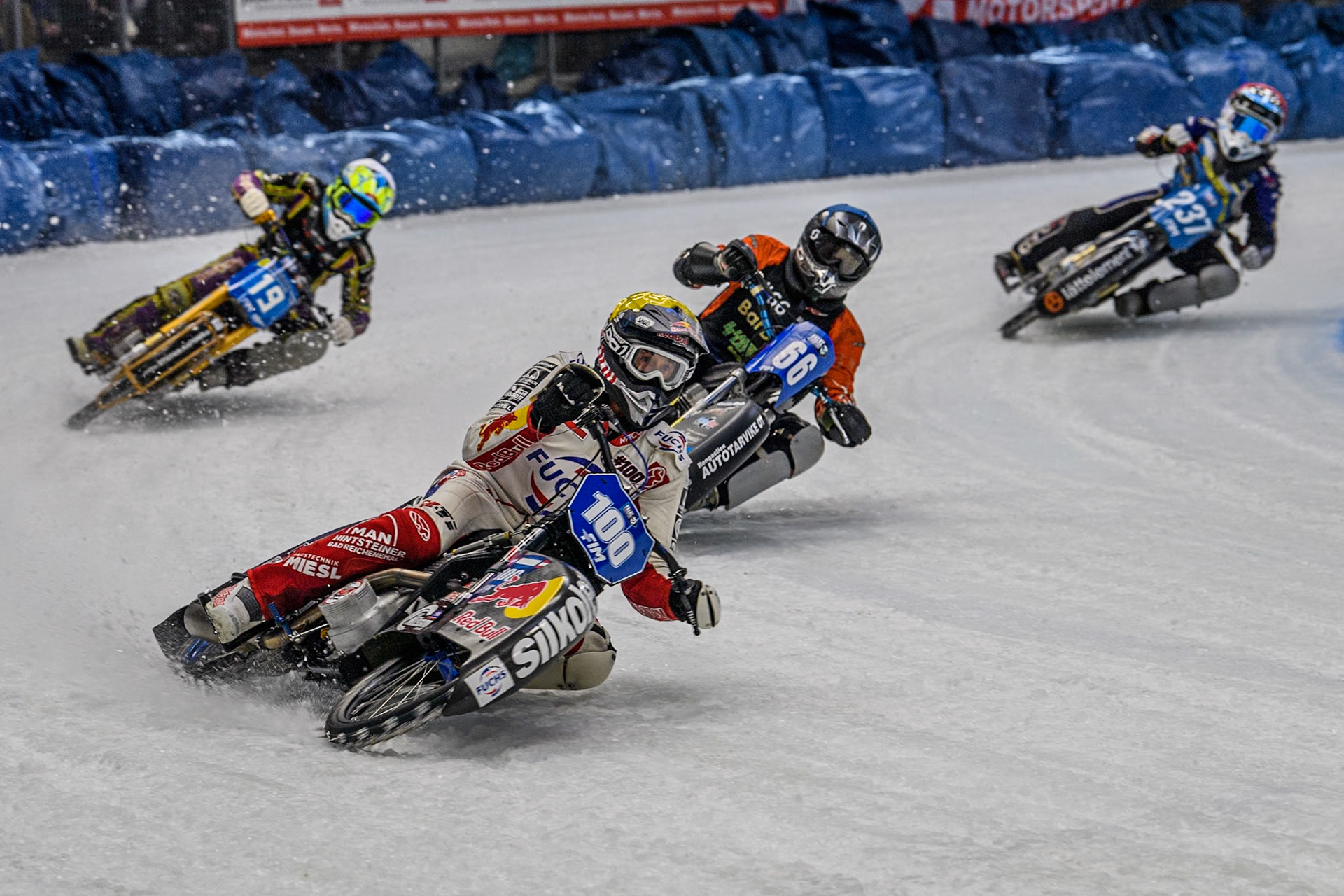 Austria's Franz Zorn (100) (Yellow) leads  Finland's Aki Ala-Riihimäki (66) (Blue), German Reserve Maximillian Neidermaier (19) (Yellow) and Sweden's Jimmy Hörnell Lidfalk (237) (Red) during the FIM Ice Speedway Gladiators World Championship Final 2 at the Max-Aicher-Arena, Inzell on Sunday 24 March 2024. (Photo: Ian Charles | MI News)