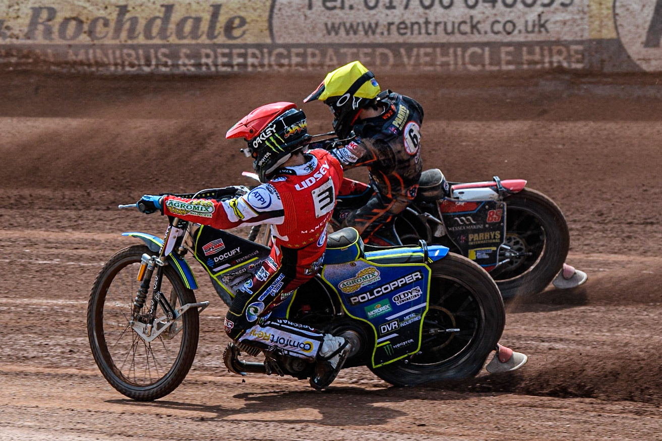 Luke Becker (Red) inside Zach Cook (Yellow) during the Sports Insure Premiership match between Belle Vue Aces and Wolverhampton Wolves at the National Speedway Stadium, Manchester on Monday 29th May 2023. (Photo: Ian Charles | MI News)