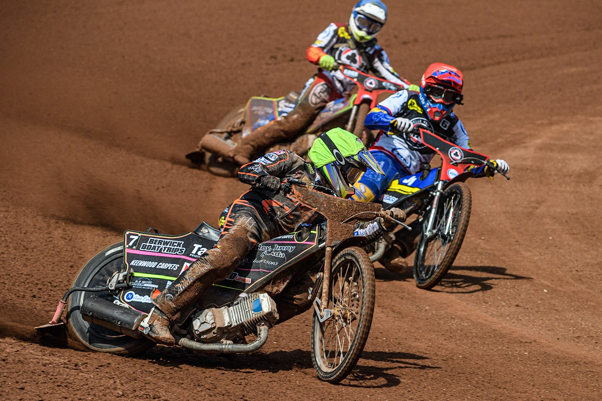 Paco Castagna (Red) inside Leon Flint (Yellow) with Jake Mulford (Blue) behind during the Sports Insure Premiership match between Belle Vue Aces and Wolverhampton Wolves at the National Speedway Stadium, Manchester on Monday 29th May 2023. (Photo: Ian Charles | MI News)
