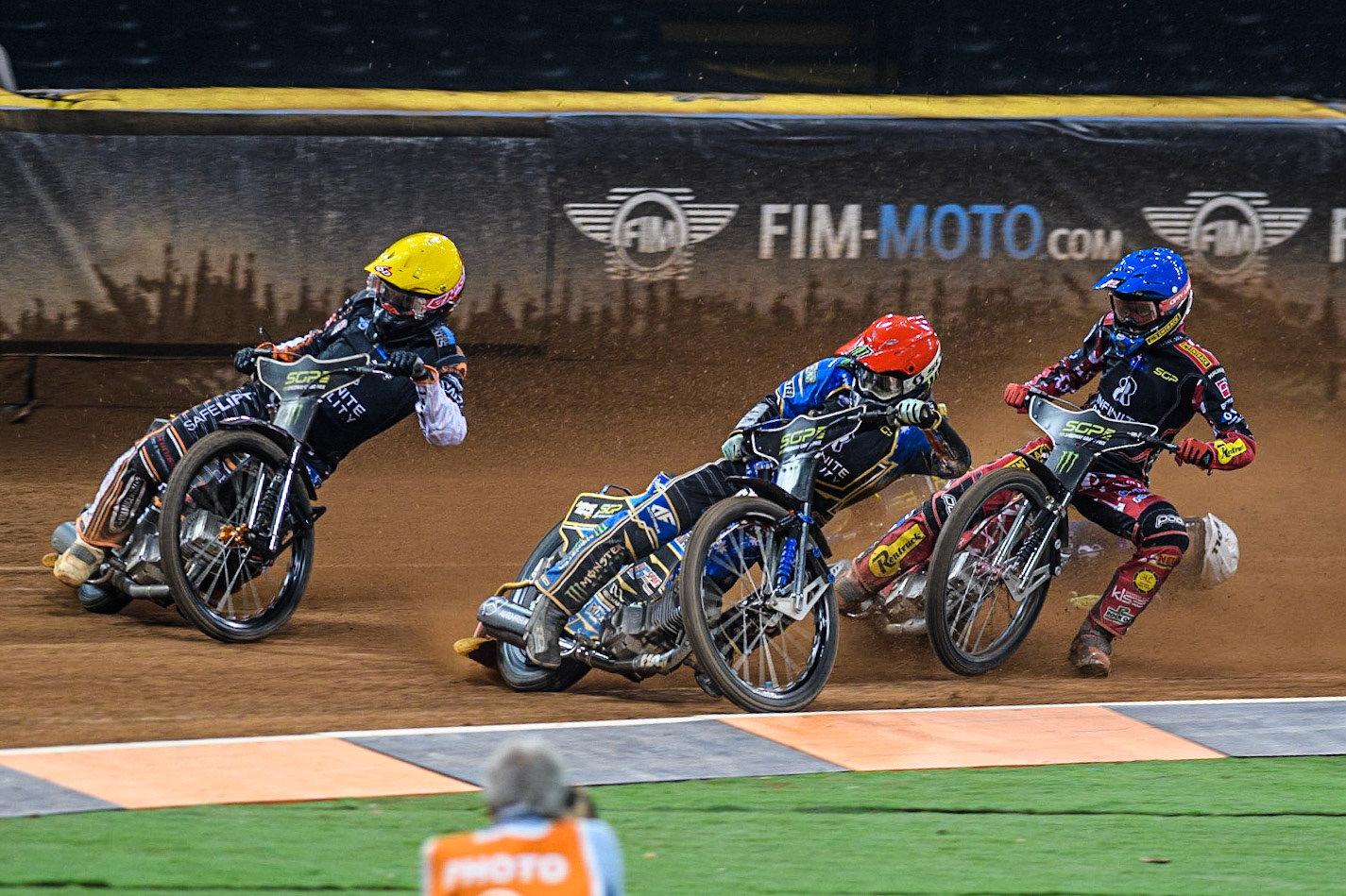 Jack Holder (25) (Red) inside Kim Nilsson (233) (Yellow) with Max Fricke (46) (Blue) behind as Jason Doyle (69) falls at the back during the FIM Speedway Grand Prix of Great Britain at the Principality Stadium, Cardiff on Saturday 2nd September 2023. (Photo: Ian Charles | MI News)