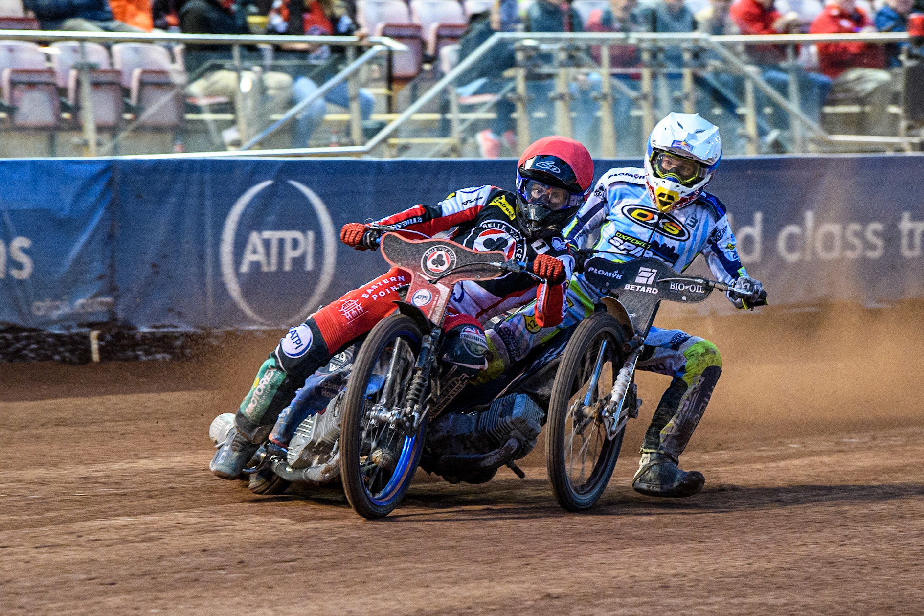 Belle Vue Aces' Brady Kurtz  in Red battles with Oxford Spires' Maciej Janowski in White during the Rowe Motor Oil Premiership match between Belle Vue Aces and Oxford Spires at the National Speedway Stadium, Manchester on Monday 22nd July 2024. (Photo: Ian Charles | MI News)
