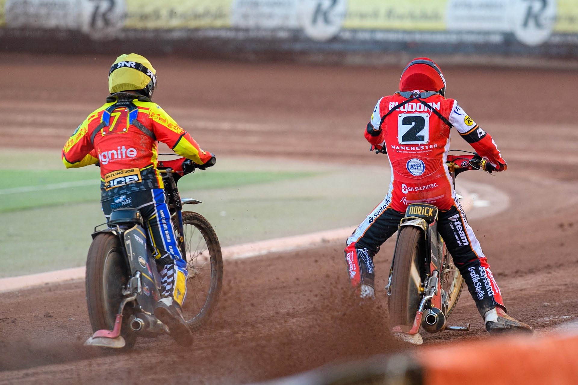 Leicester Lions' Joe Thompson (Left) in Yellow and Belle Vue Aces' Norick Blodorn in Red leave the start in Heat 8 during the Rowe Motor Oil Premiership match between Belle Vue Aces and Leicester Lions at the National Speedway Stadium, Manchester on Monday 19th May 2025. (Photo: Ian Charles | MI News)