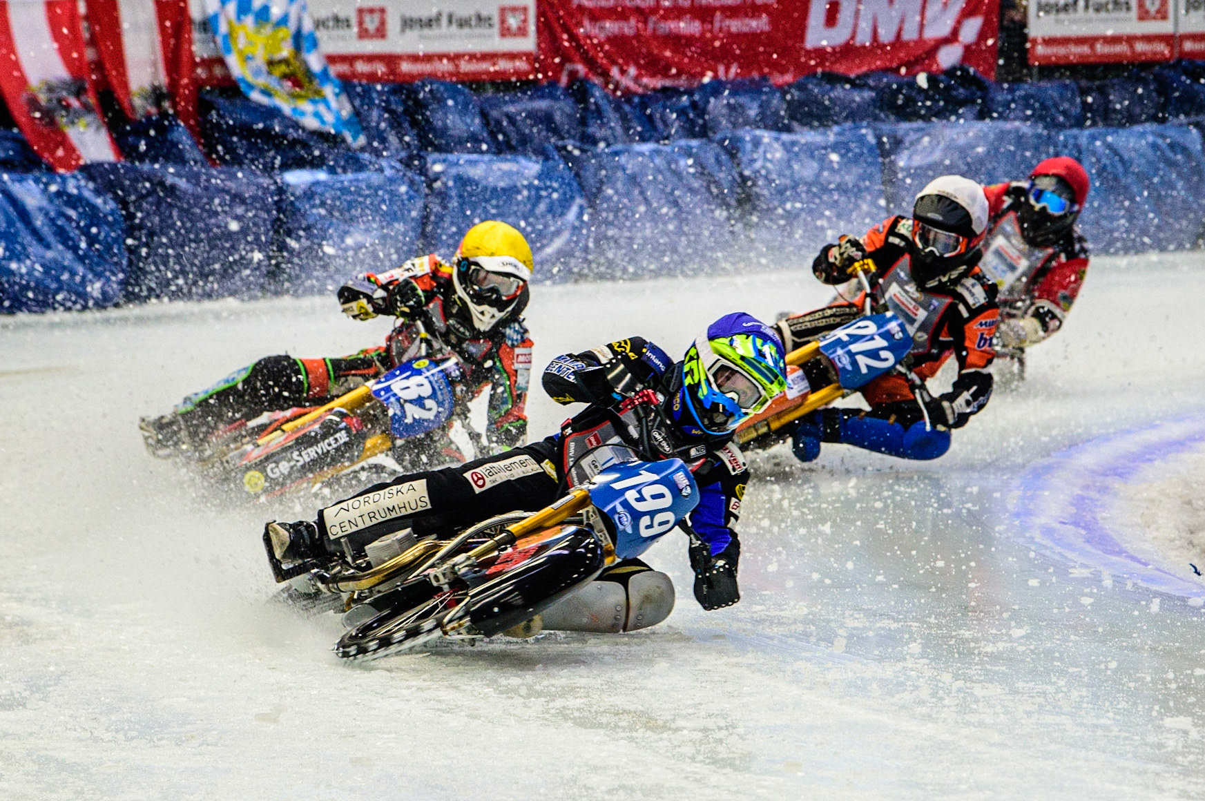 Martin Haarahiltunen (199) (Blue) leads Markus Jell (82) (Yellow) Lukas Hutla (212) (White) and Jo Saetre (357) (Red) during the Ice Speedway Gladiators World Championship Final 2 at Max-Aicher-Arena, Inzell, Germany on Sunday 19th March 2023. (Photo: Ian Charles | MI News)