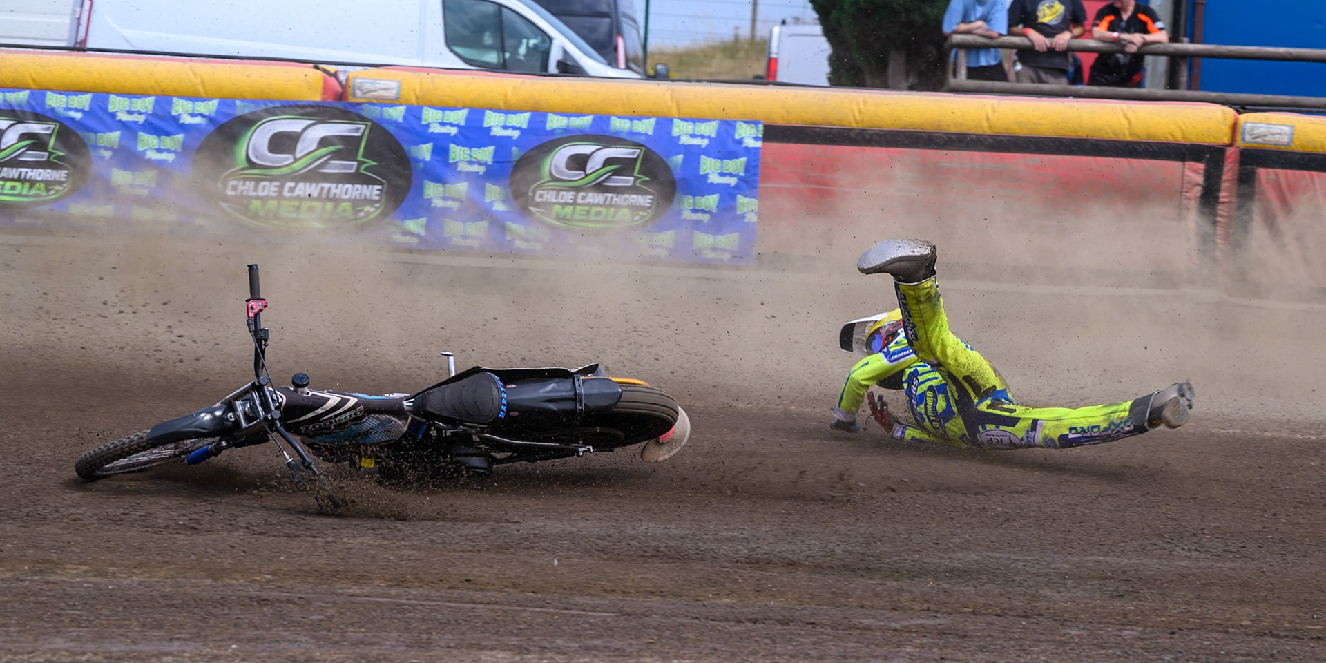 Harry Fletcher of Oxford Chargers in Yellow  falls during the WSRA National Development League match between Buxton Bulls and Oxford Chargers at Hi-Edge Speedway, Buxton on Sunday 2nd August 2026. (Photo: Ian Charles | MI News)