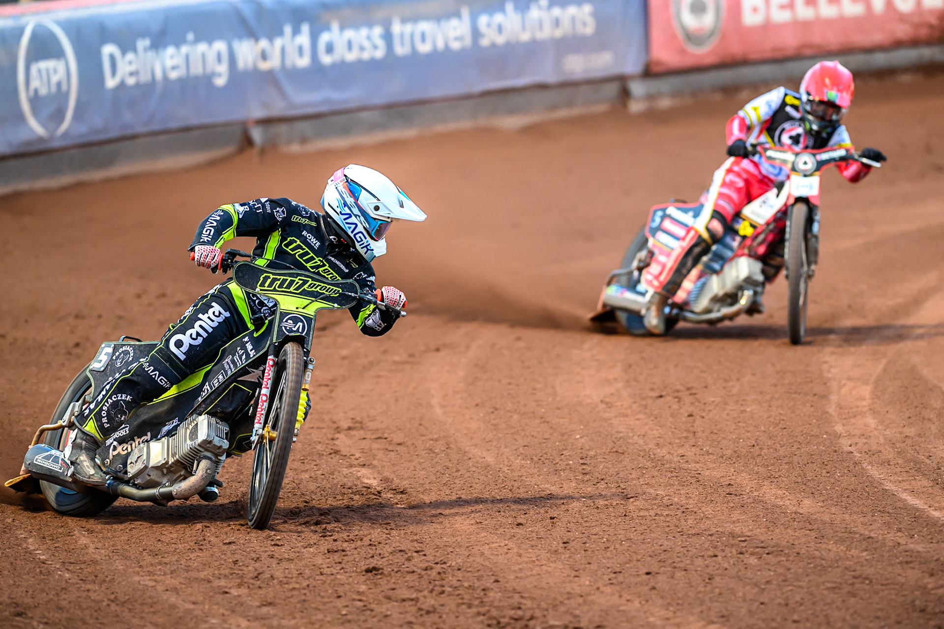 Emil Sayfutdinov of Ipswich Witches  in White leading Dan Bewley of Belle Vue Aces  in Red during the Rowe Motor Oil Premiership match between Belle Vue Aces and Ipswich Witches at the National Speedway Stadium, Manchester on Monday 4th August 2025. (Photo: Ian Charles | MI News)