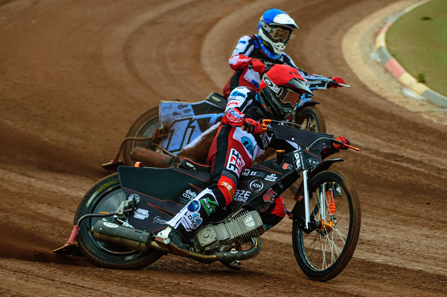 Jack Smith  (Red) outside Sam McGurk  (Blue) during the National Development League match between Belle Vue Colts and Mildenhall Fens Tigers at the National Speedway Stadium, Manchester on Friday 15th July 2022. (Credit: Ian Charles | MI News)