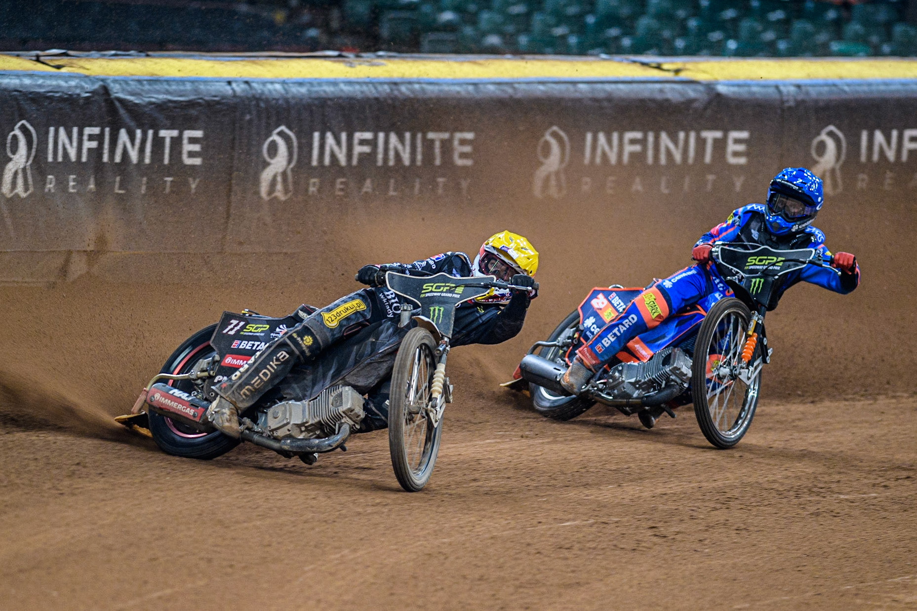 Maciej Janowski (71) (Yellow) leads  Andzejs Lebedevs (29) (Blue) during the FIM Speedway Grand Prix of Great Britain at the Principality Stadium, Cardiff on Saturday 2nd September 2023. (Photo: Ian Charles | MI News)