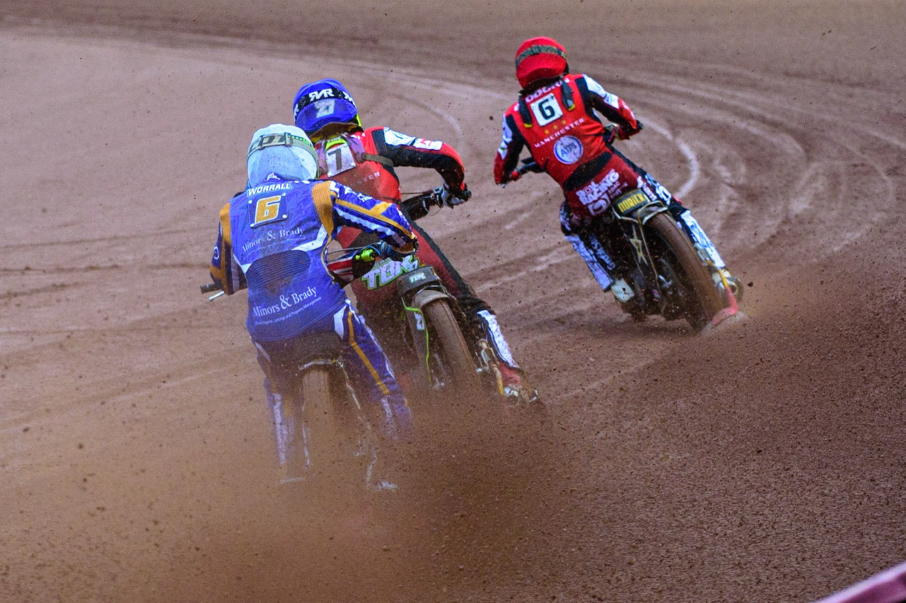 MANCHESTER, UK. MAY 16TH Richie Worrall   (White) chases Tom Brennan (Blue) and Norick Blödorn  (Red) during the SGB Premiership match between Belle Vue Aces and King's Lynn Stars at the National Speedway Stadium, Manchester on Monday 16th May 2022. (Credit: Ian Charles | MI News)