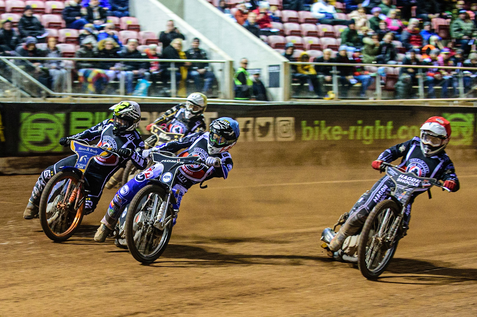 MANCHESTER, UK. OCT 23RD  Dan Bewley  (Blue) leads Broc Nicol  (Red), Erik Riss  (White) and Nick Blödorn  (Yellow) during the Peter Craven Memorial Trophy event at the National Speedway Stadium, Manchester on Saturday 23rd October 2021. (Credit: Ian Charles | MI News)
