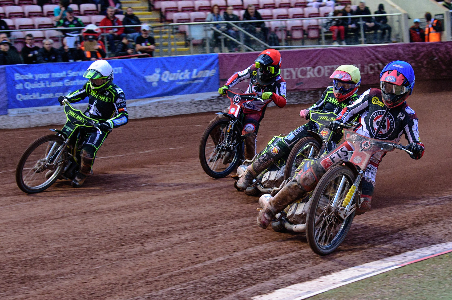 MANCHESTER, UK. JUN 6TH  Jye Etheridge (Blue)  leads Danny King  (White)Ben Barker  (Yellow) and Tom Brennan  (Red) during the SGB Premiership match between Belle Vue Aces and Ipswich Witches at the National Speedway Stadium, Manchester on Monday 6th June 2022. (Credit: Ian Charles | MI News)