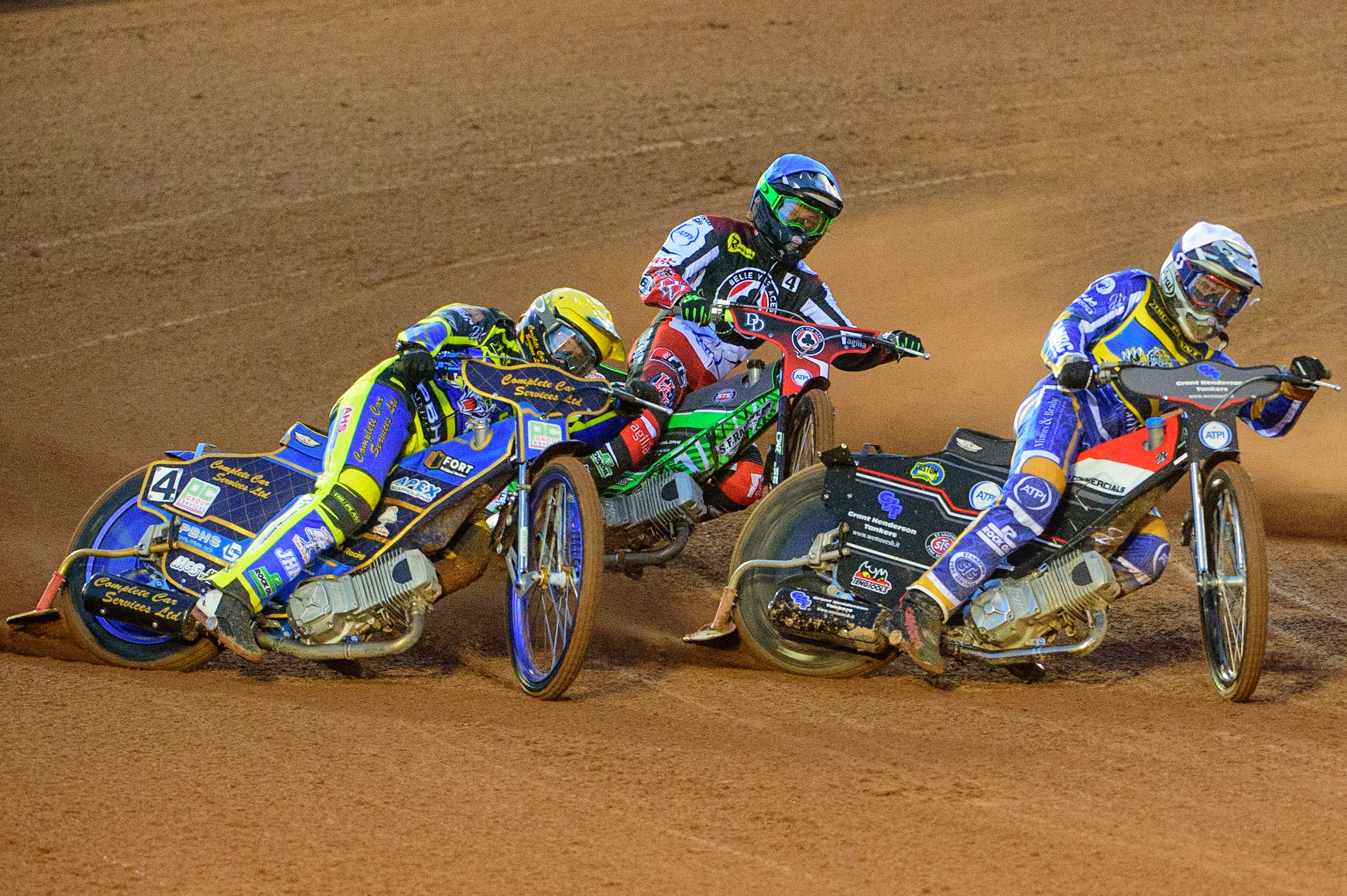 MANCHESTER, UK.  MAR 28TH. Richie Worrall of Sheffield  (White) and Kyle Howarth of Sheffield  (Yellow) lead Charles Wright of Belle Vue  (Blue)  during the SGB Premiership League Cup match between Belle Vue Aces and Sheffield Tigers at the National Speedway Stadium, Manchester on Monday 28th March 2022. (Credit: Ian Charles | MI News)