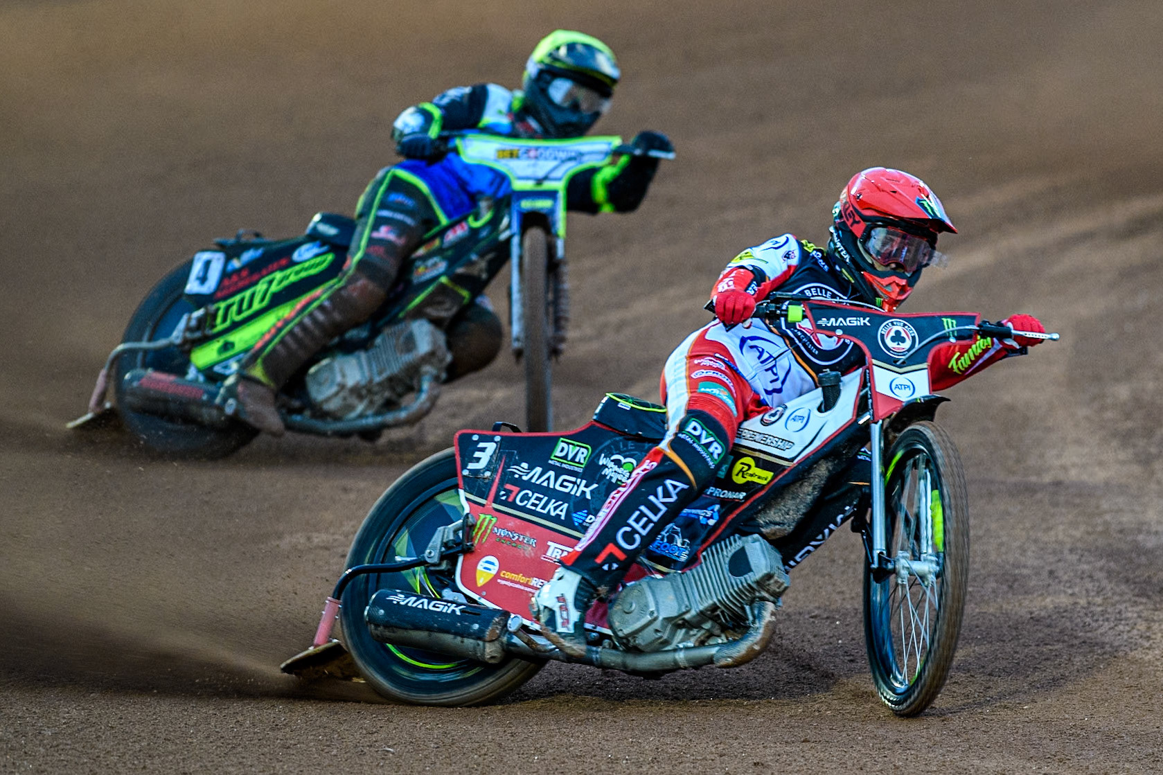 Belle Vue Aces' Jaimon Lidsey in Red leading Oxford Spires' Guest Rider Dan Thompson in Yellow during the Rowe Motor Oil Premiership match between Belle Vue Aces and Oxford Spires at the National Speedway Stadium, Manchester on Monday 14th April 2025. (Photo: Ian Charles | MI News)