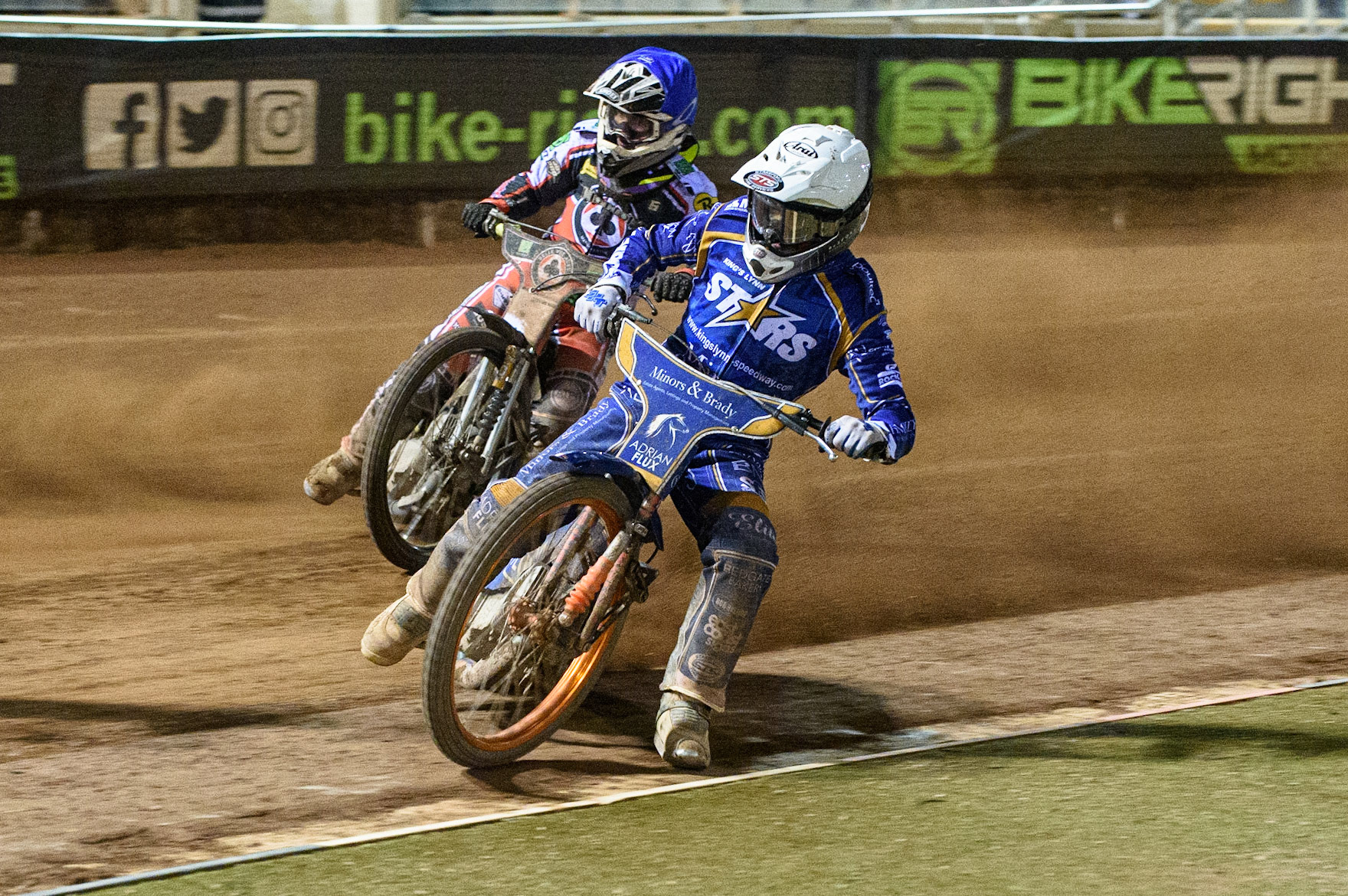 MANCHESTER, UK. SEPT 13TH  Lewis Kerr (White) leads Tom Brennan  (Blue) during the SGB Premiership match between Belle Vue Aces and King's Lynn Stars at the National Speedway Stadium, Manchester on Monday 13th September 2021. (Credit: Ian Charles | MI News)