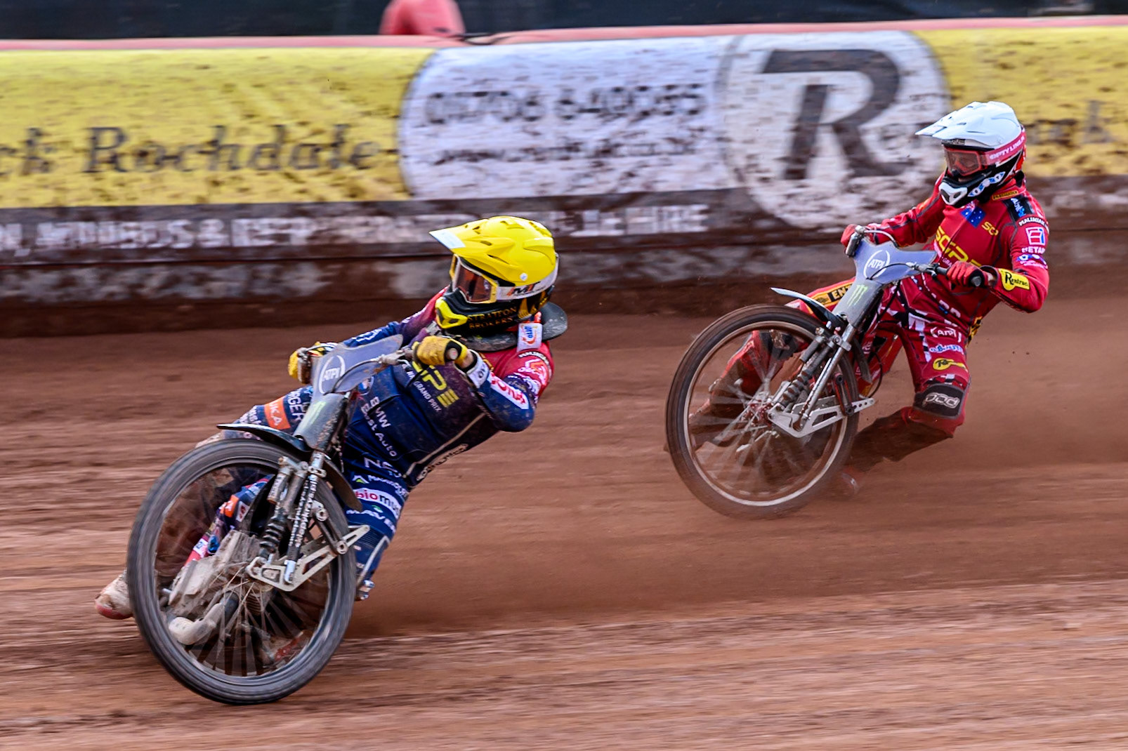 Dominik Kubera (415) of Poland in Yellow leading Max Fricke (46) of Australia in White during the ATPI FIM Speedway Grand Prix Round 4 at the National Speedway Stadium, Manchester, on Friday 13th June 2025. (Photo: Ian Charles | MI News)