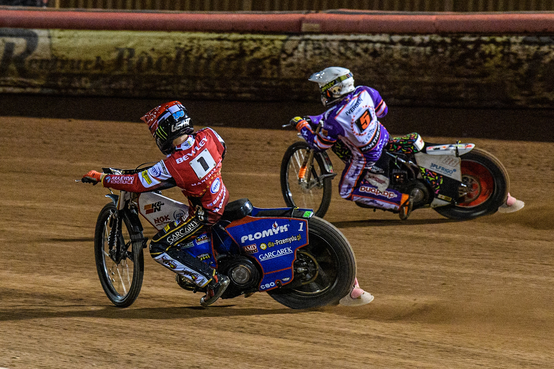 Dan Bewley  (Red) inside Niels-Kristian Iversen  (White) during the SGB Premiership match between Belle Vue Aces and Peterborough at the National Speedway Stadium, Manchester on Monday 24th April 2023. (Photo: Ian Charles | MI News)