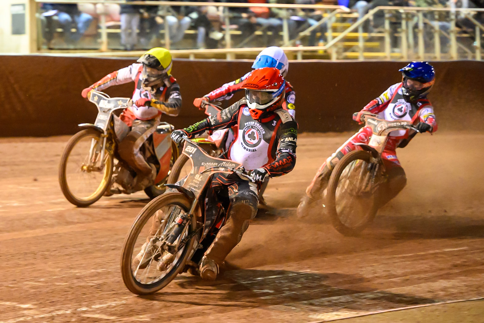 Jan Kvech  in Red leading Dan Bewley  in Blue, Reserve Rider Will Cairns  in White and Norick Blodorn  in Yellow during the Peter Craven Memorial Trophy at the National Speedway Stadium, Manchester, on Monday 16th March 2026. (Photo: Ian Charles | MI News)