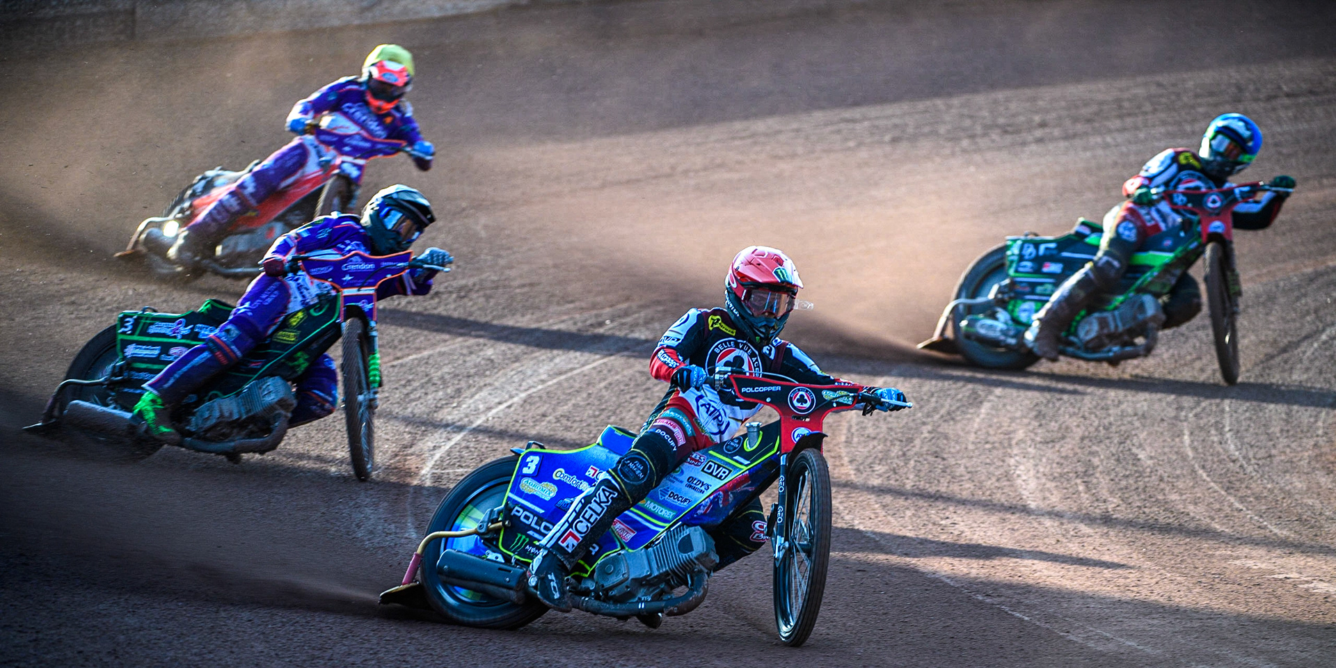 Jaimon Lidsey (Red) leads Benjamin Basso (White) Charles Wright (Blue) and Richie Worrall (Yellow) during the Sports Insure Premiership match between Belle Vue Aces and Peterborough at the National Speedway Stadium, Manchester on Monday 19th June 2023. (Photo: Ian Charles | MI News)