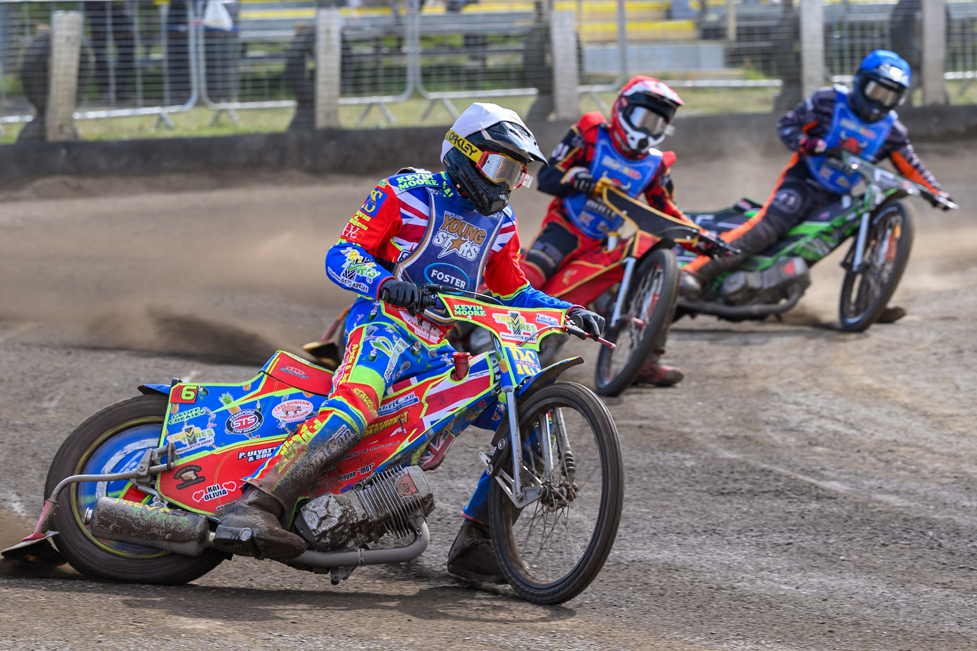 Simon Lambert of Kings Lynn Young Stars in White leading Luke Harris of Buxton Bulls  in Red  and Jack Roberts of Buxton Bulls in Blue during the WSRA National Development League match between Buxton Bulls and King's Lynn Young Stars at Hi-Edge Speedway, Buxton on Sunday 9th August 2026. (Photo: Ian Charles | MI News)