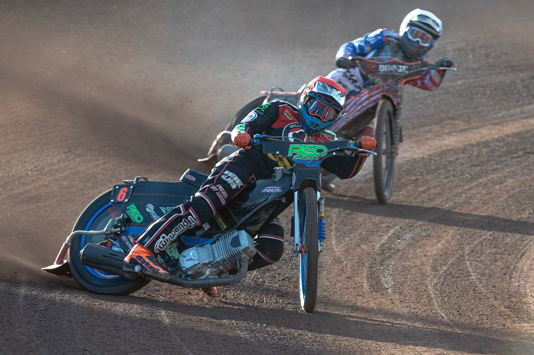 Photo by Ian Charles

Dimitri Berge  (Red) leads Luke Becker  (White)

Belle Vue Aces v Poole Pirates, British Speedway Premiership, Belle Vue National Speedway Stadium, Manchester, Monday 1  July  2019