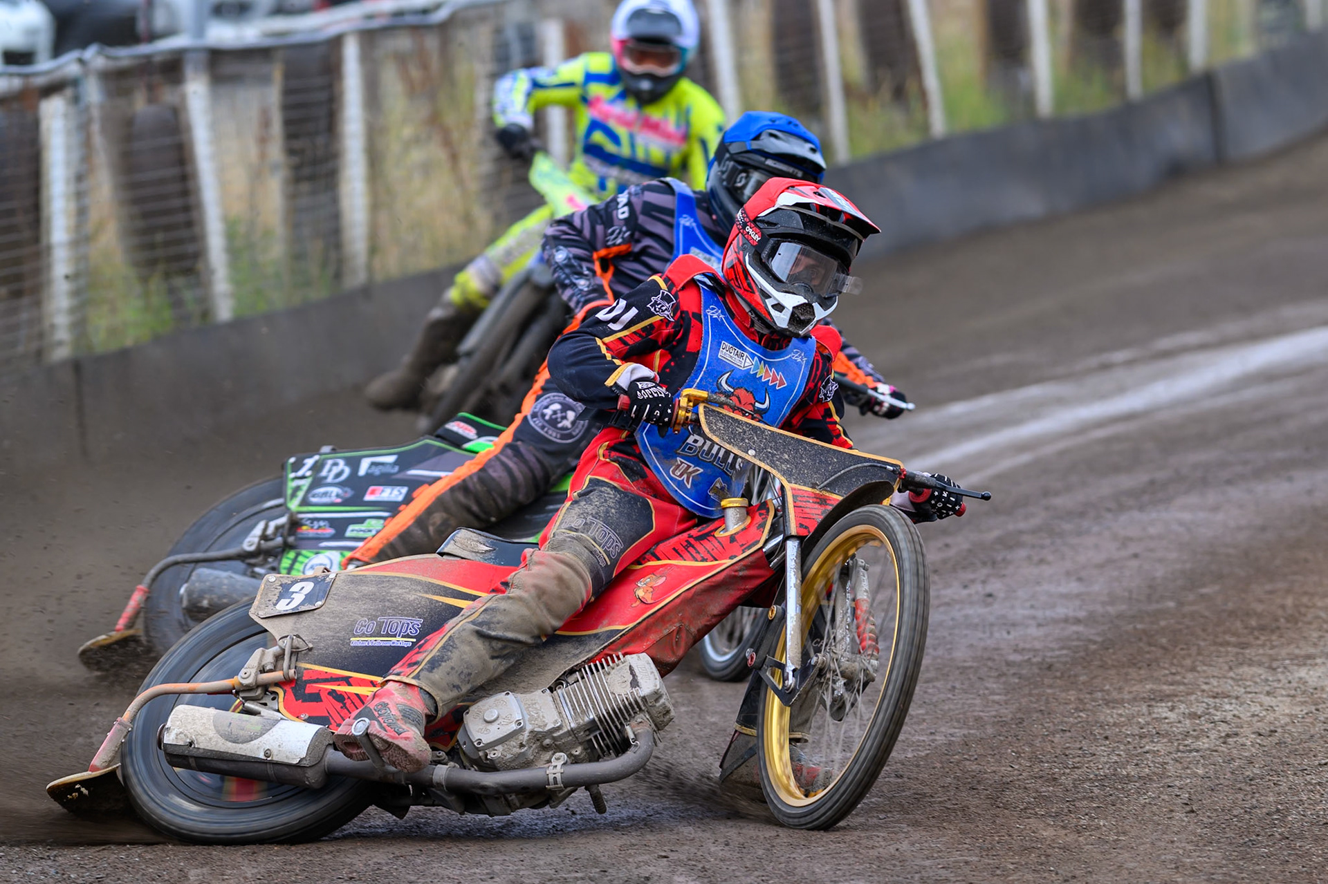 Luke Harris of Buxton Bulls in Red  and Jack Roberts of Buxton Bulls in Blue  leading Ashton Vale of Oxford Chargers in White during the WSRA National Development League match between Buxton Bulls and Oxford Chargers at Hi-Edge Speedway, Buxton on Sunday 2nd August 2026. (Photo: Ian Charles | MI News)