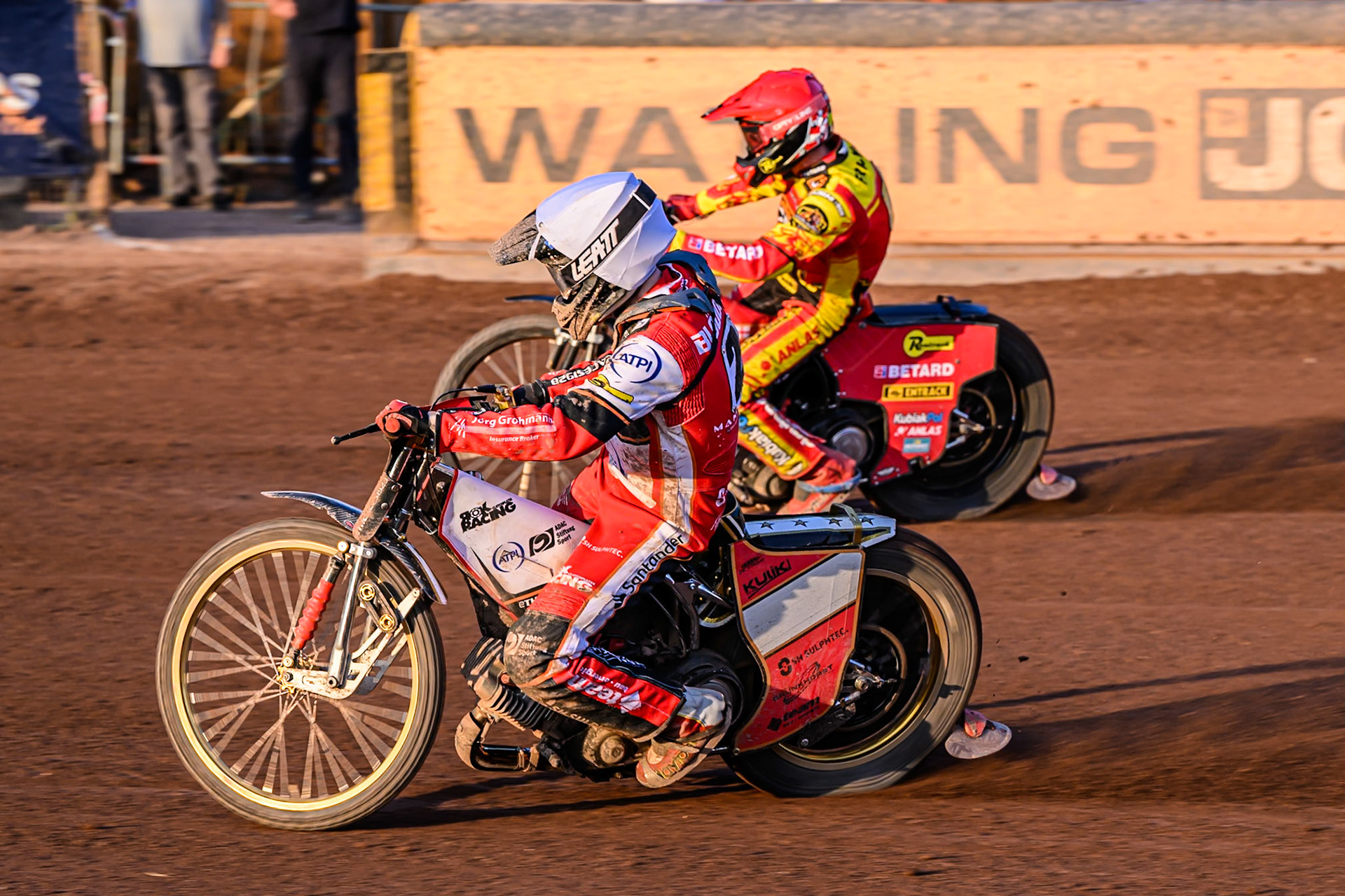 Belle Vue Aces' Norick Blodorn in White rides inside Leicester Lions' Max Fricke in Red during the Rowe Motor Oil Premiership match between Leicester Lions and Belle Vue Aces at the Hydroscand Arena, Leicester on Thursday 19th June 2025. (Photo: Ian Charles | MI News)