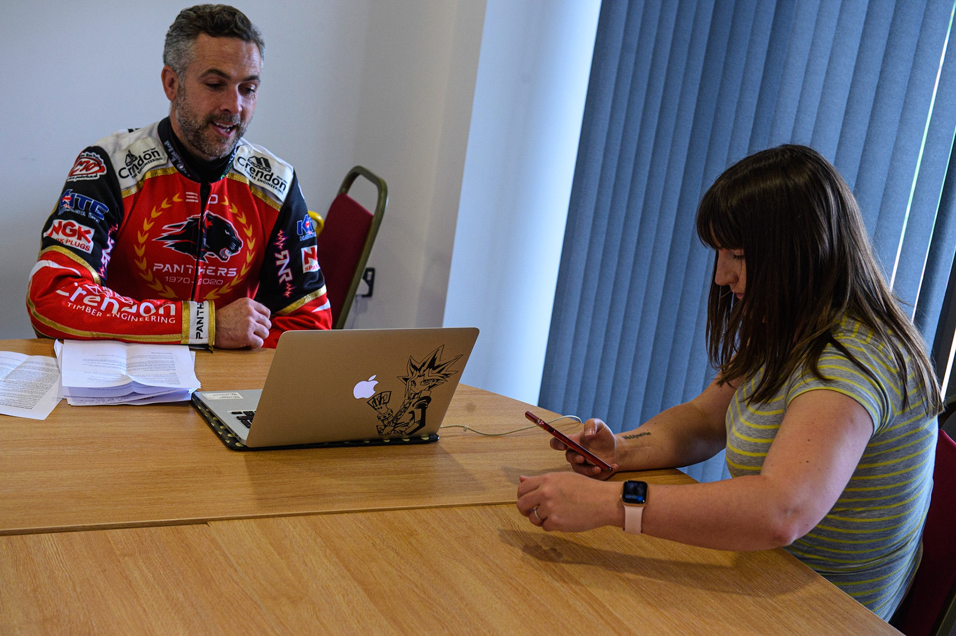 Photo: Ian CharlesScott Nichols (l) chats on the Zoom Call whilst Belle Vue Press Officer Hayley Bromley checks the feedDiscovery Networks Eurosport Speedway Season Launch, National Speedway Stadium, Manchester Wednesday  12  May  2021
