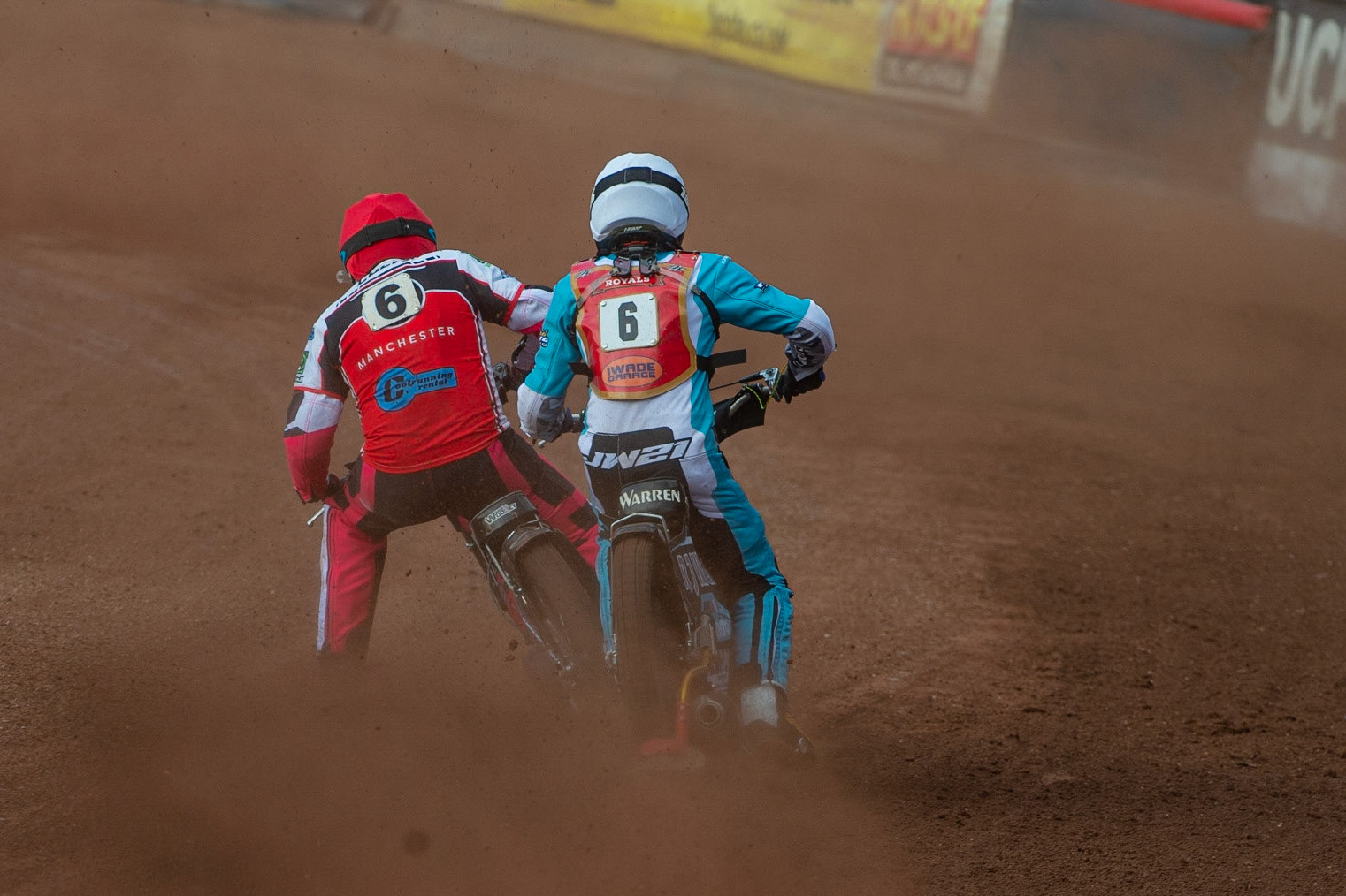 MANCHESTER, UK. JULY 2ND  Sam Woolley  (Red) passes Josh Warren  (White) during the National Development League match between Belle Vue Colts and Kent Royals at the National Speedway Stadium, Manchester on Friday 2nd July 2021. (Credit: Ian Charles | MI News)
